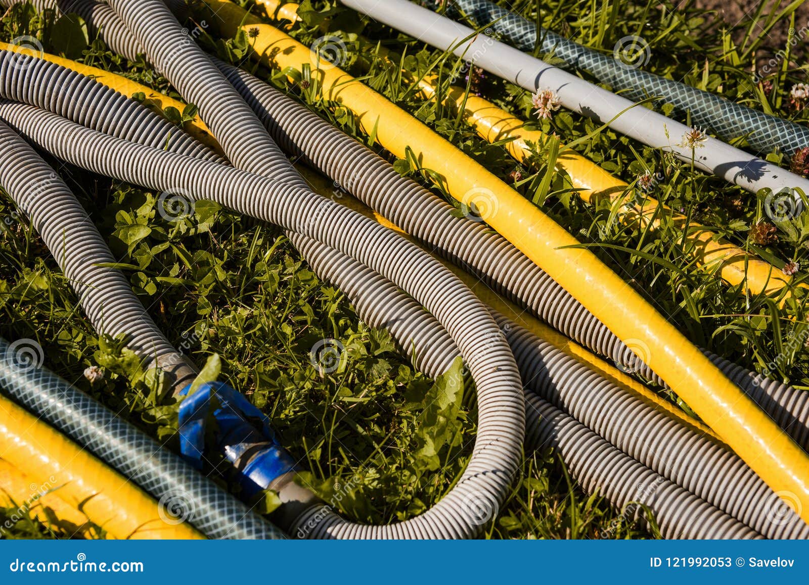 Garden Hoses is Rolled Up Blue Tape Stock Image Image of water