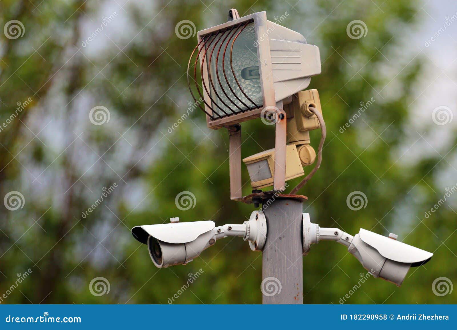 Garden Spotlight with Motion Detectors and CCTV Cameras Stock Photo