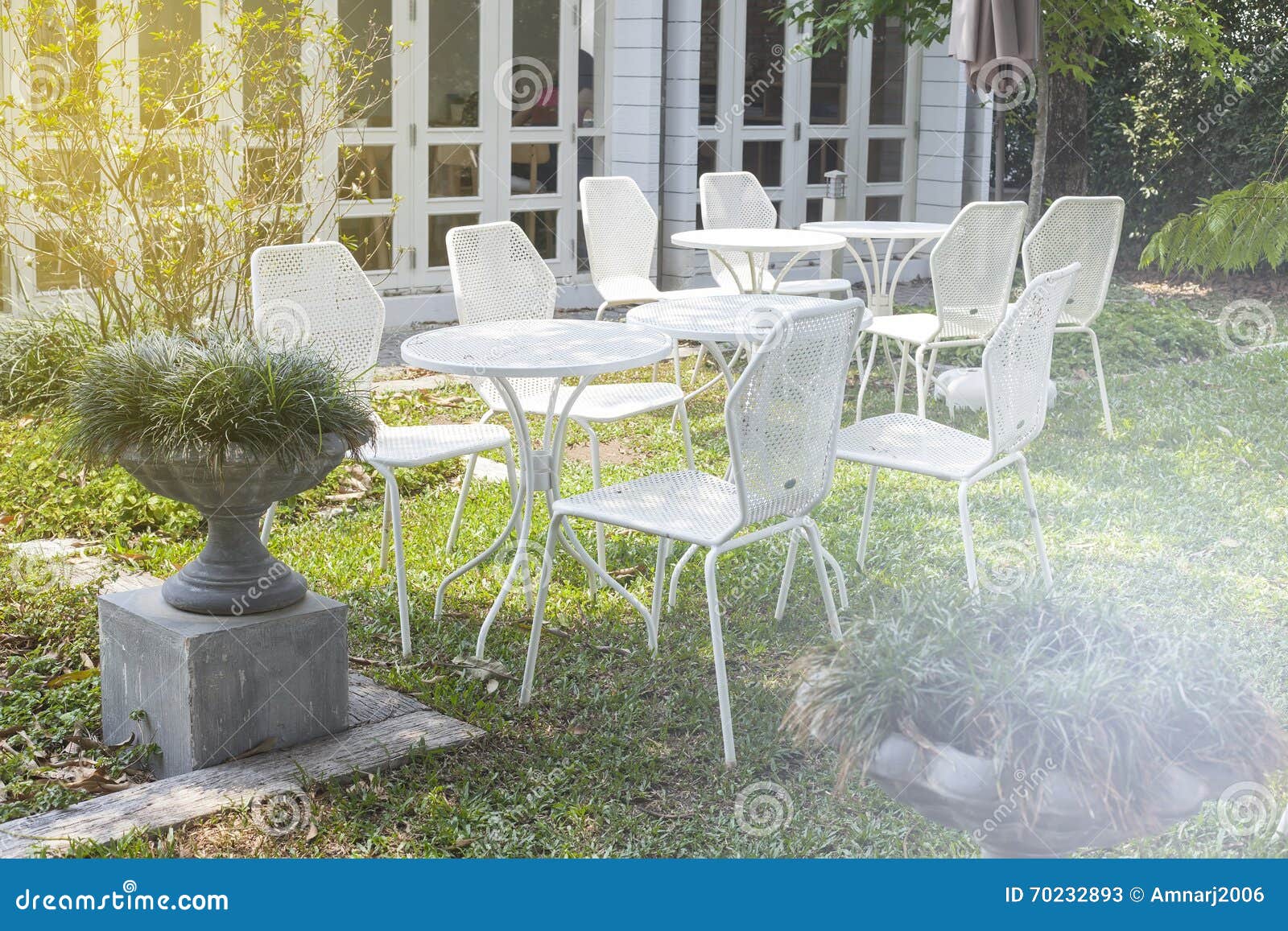 Garden table and chairs stock image. Image of gravel 70232893