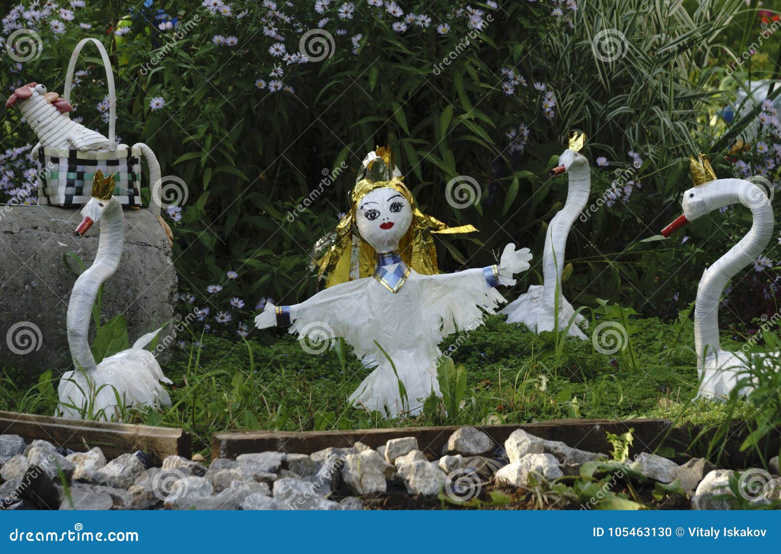 Garden toys in the garden stock photo. Image of green 105463130