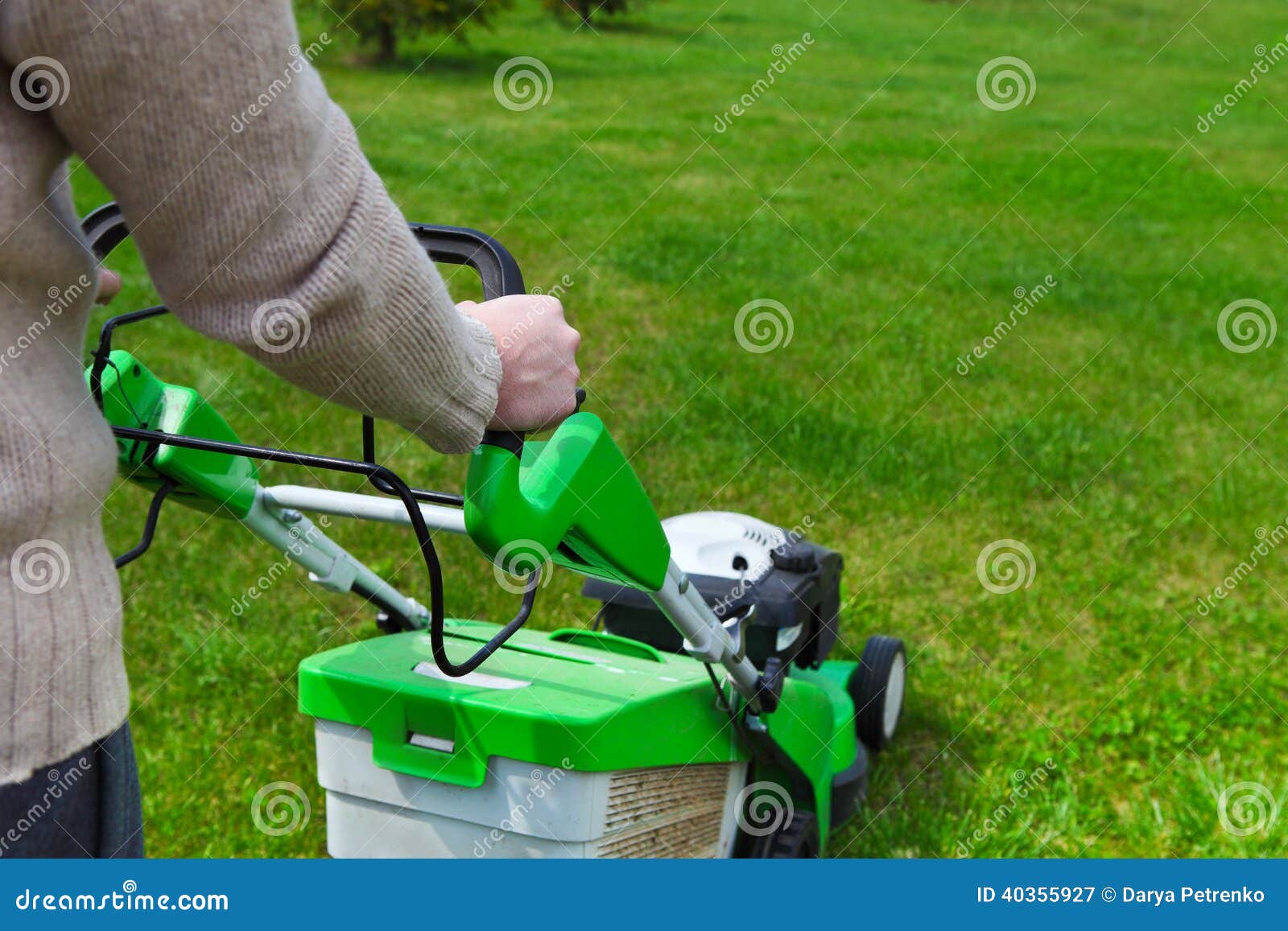 Boy Gardener Mowing The Lawn Stock Image 21094453