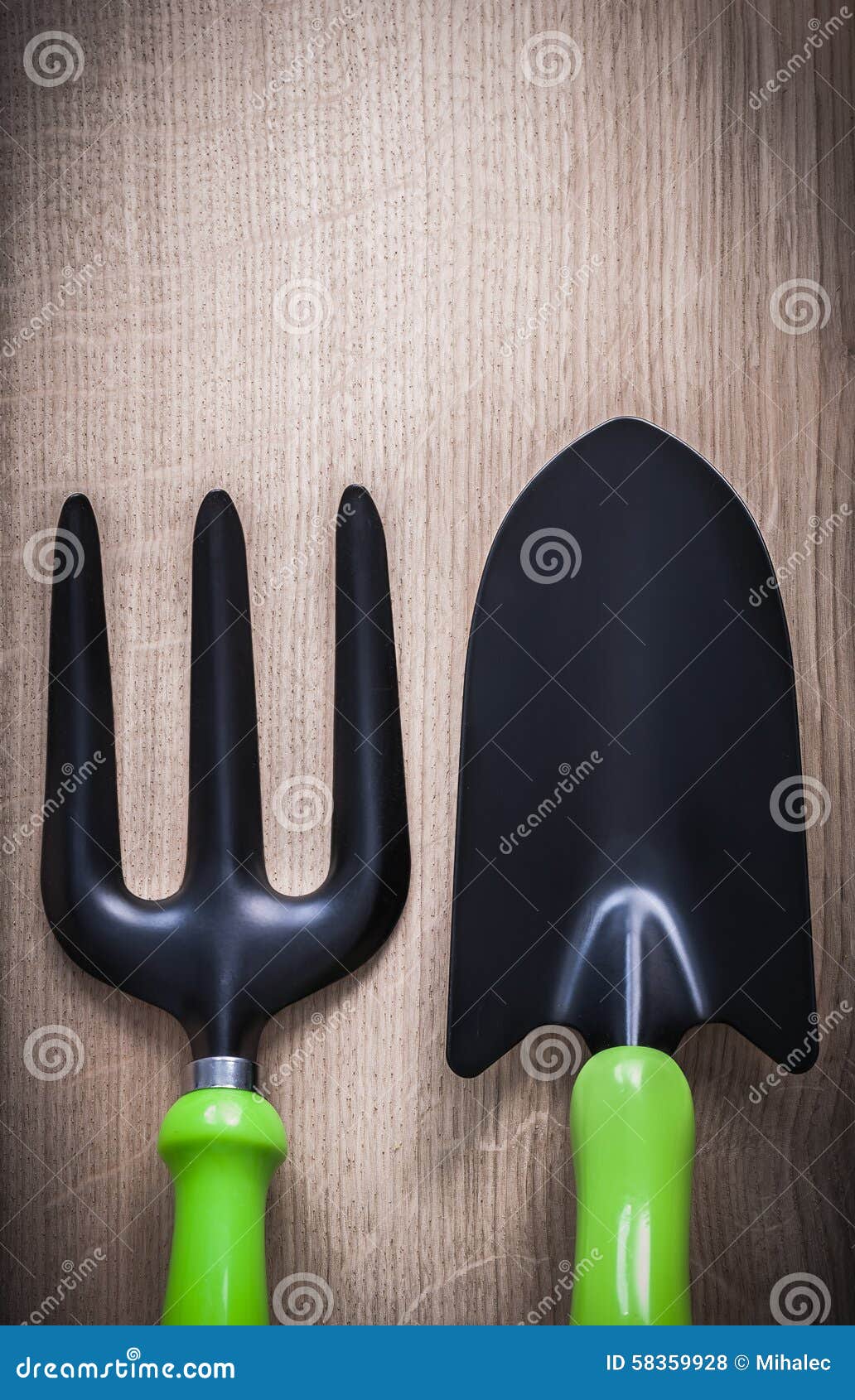 Gardening Metal Black Hand Spade with Trowel Fork on Wooden Surf Stock ...