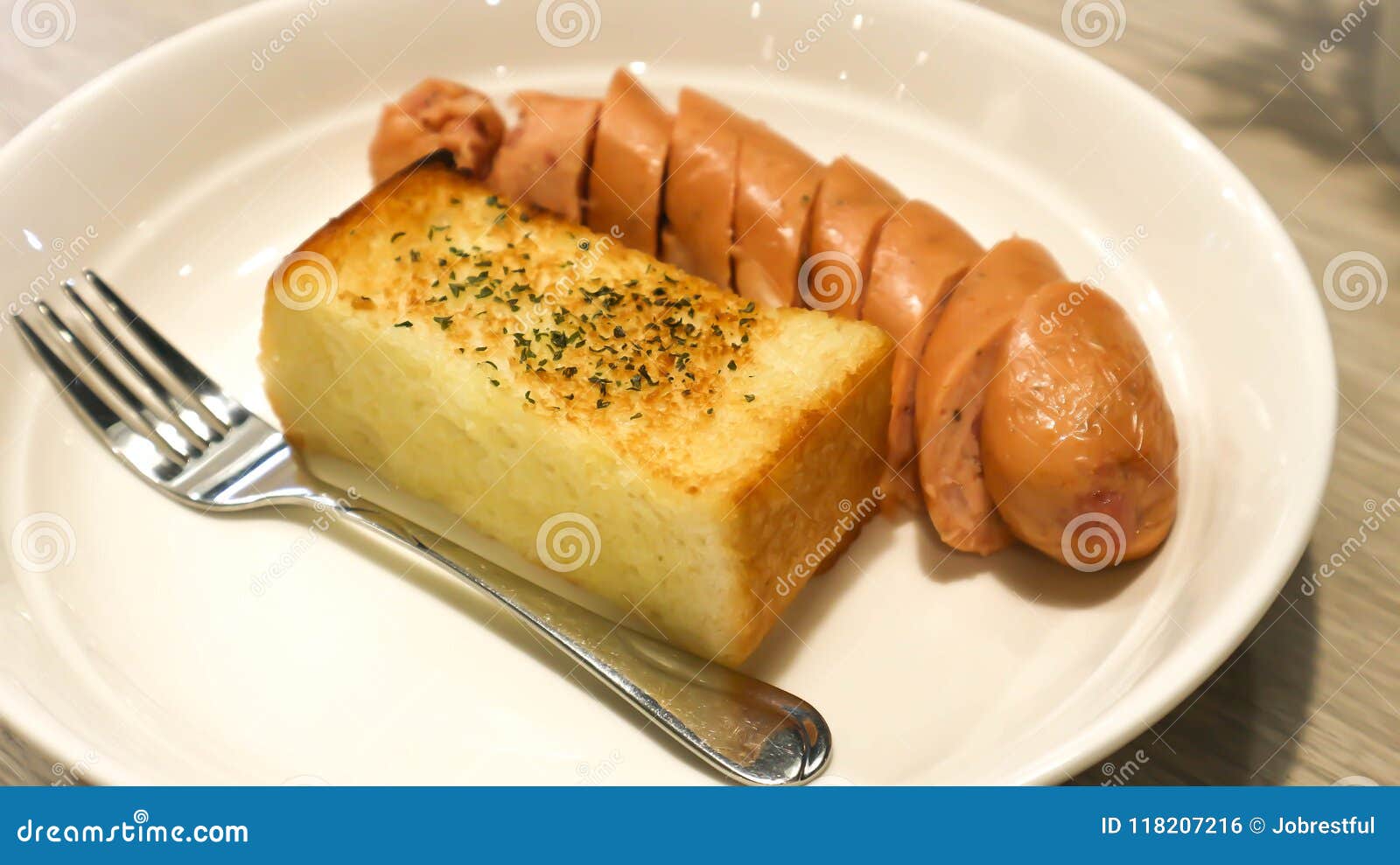 Garlic bread and sausage stock photo. Image of sausage 118207216