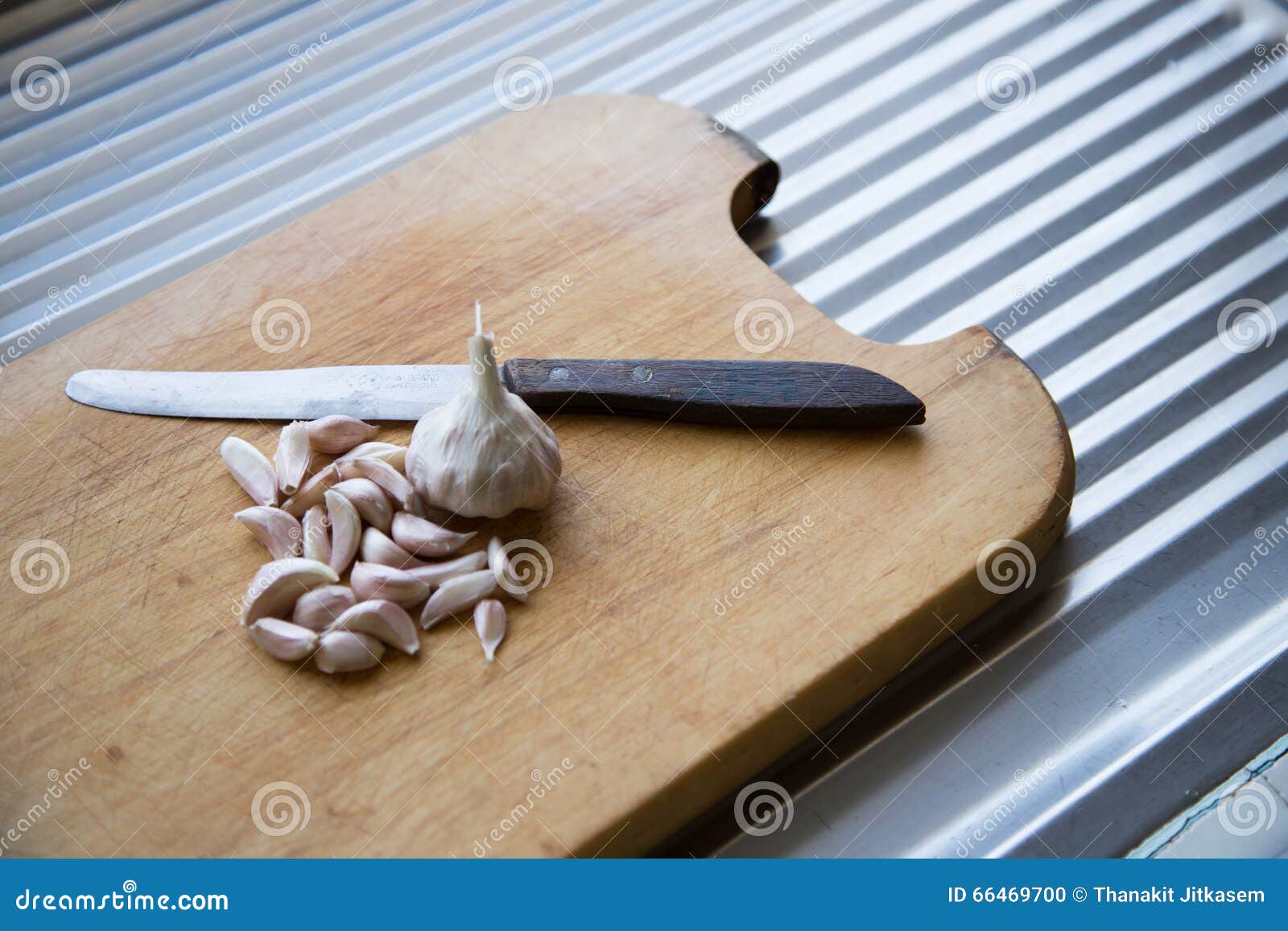 Garlic with knife stock photo. Image of asian, chop, kitchen 66469700