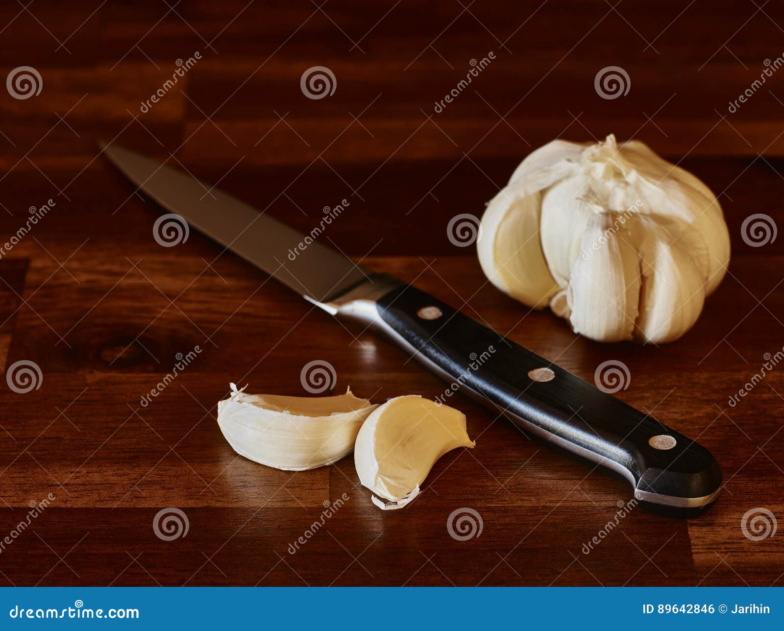 Garlic and knife stock photo. Image of texture, aromatic 89642846