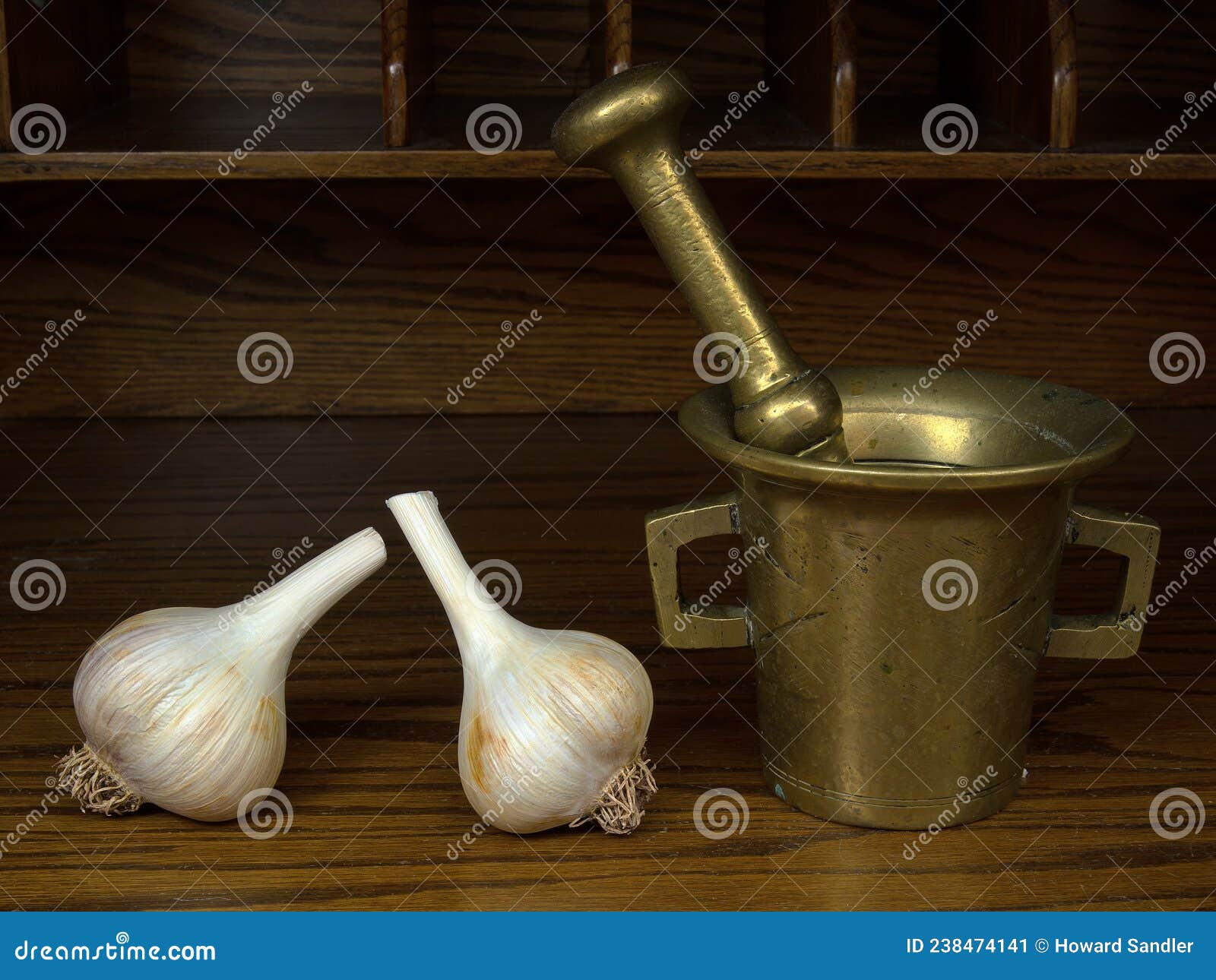 Garlic, mortar and pestle stock image. Image of vintage 238474141