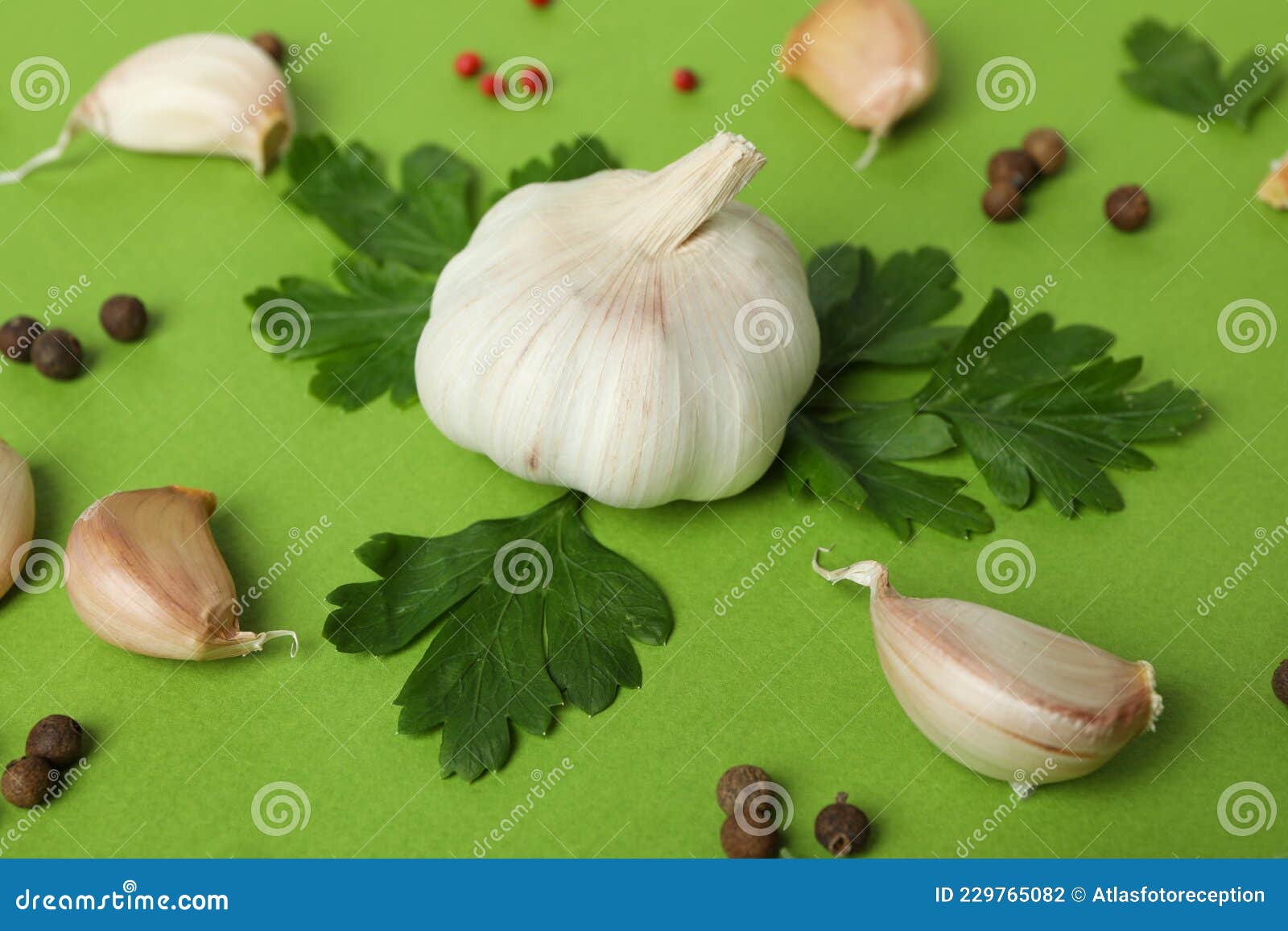 Garlic, Parsley and Spices on Green Background Stock Photo Image of