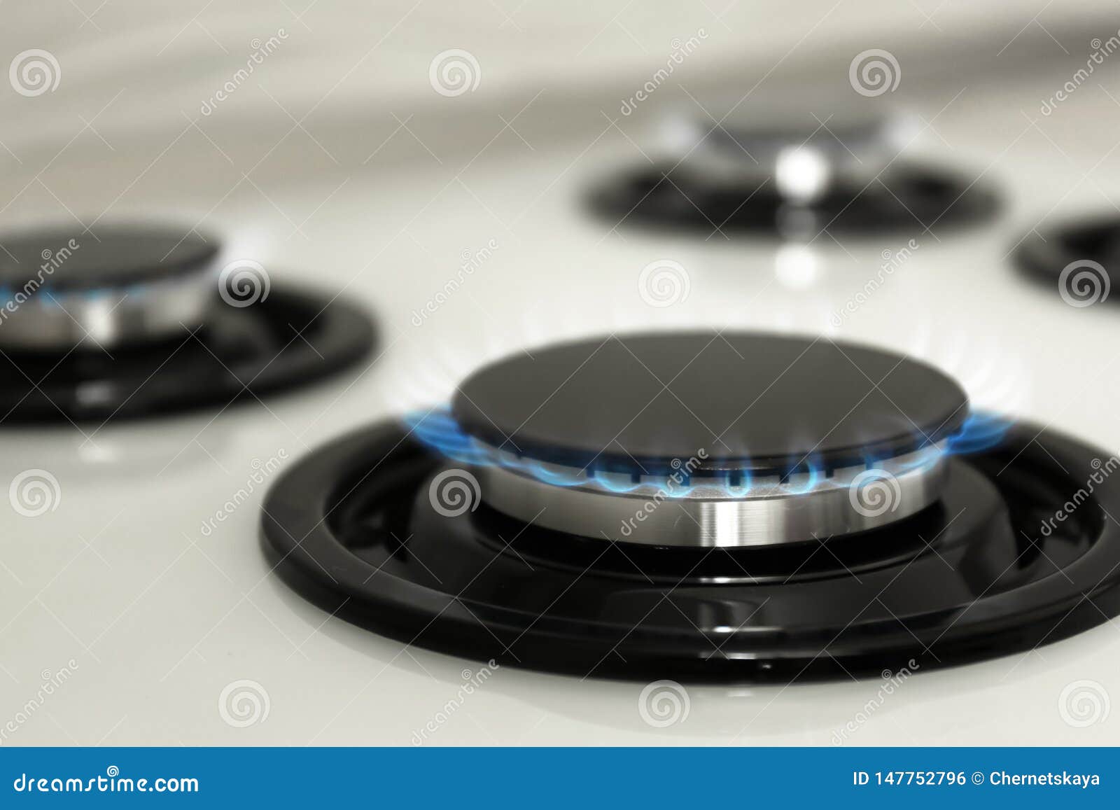 Gas Burner with Blue Flame on Modern Stove Stock Photo Image of cooker, fire 147752796