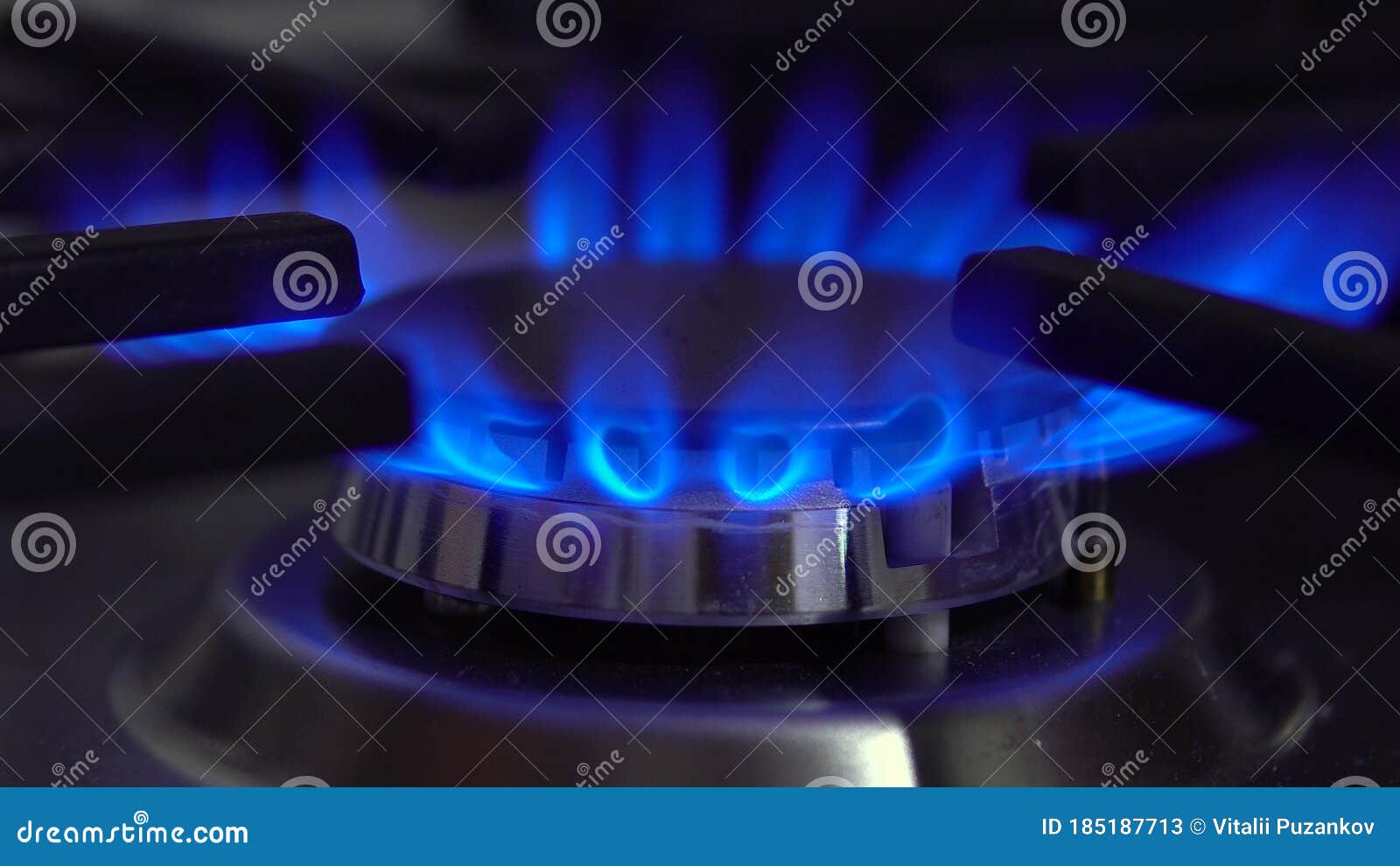 The Gas Burner on the Stove Burns. the Flame is Blue Stock Image