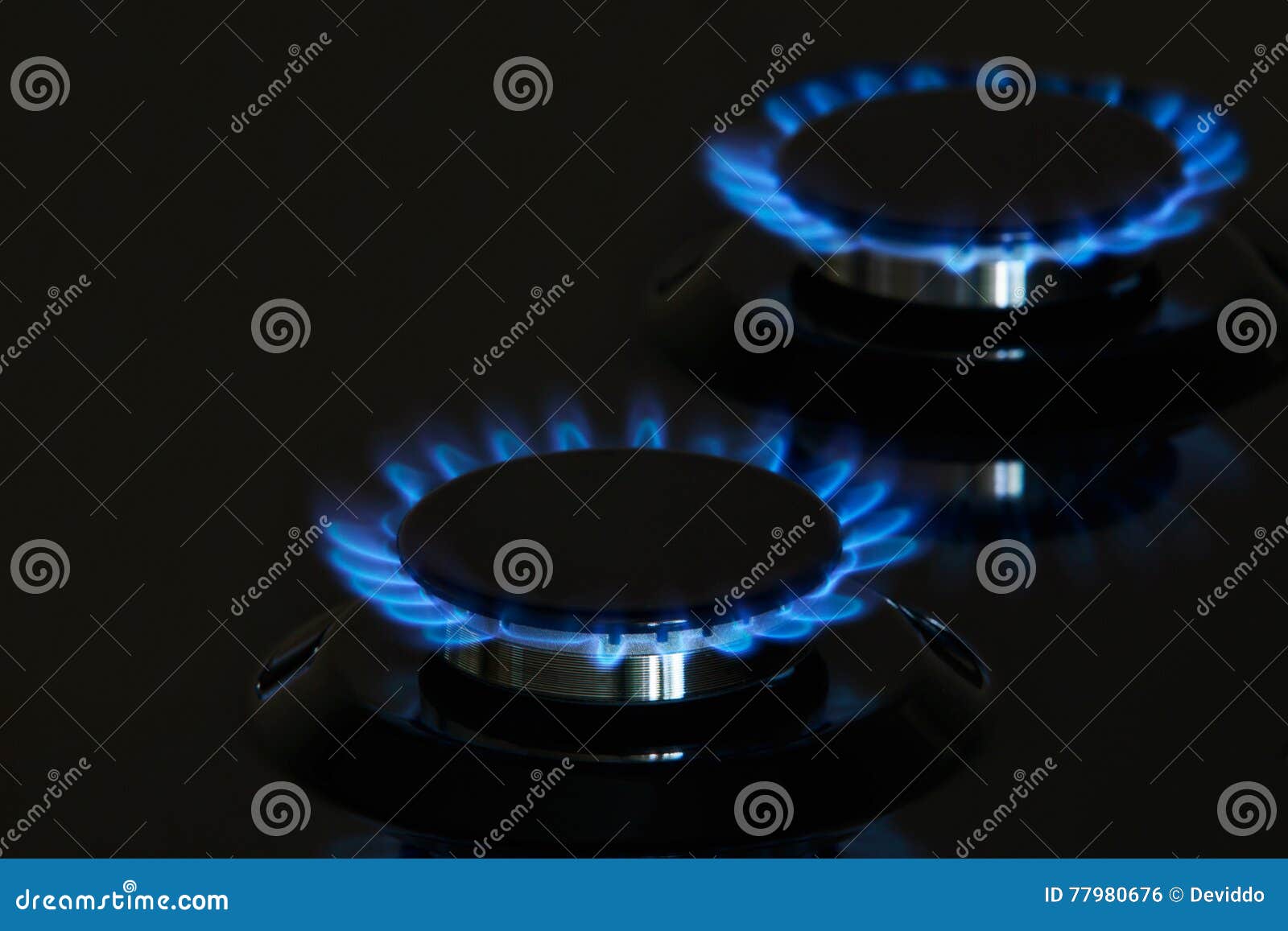 Gas burners lit stock photo. Image of kitchen, dark, torch 77980676
