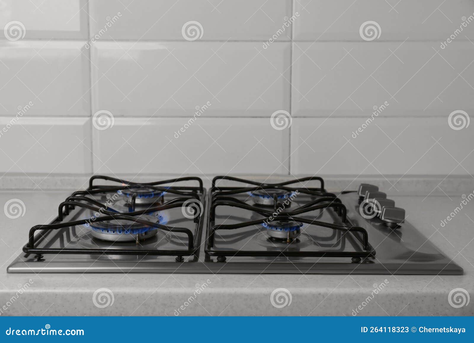Gas Cooktop with Burning Blue Flames in Kitchen Stock Image Image of