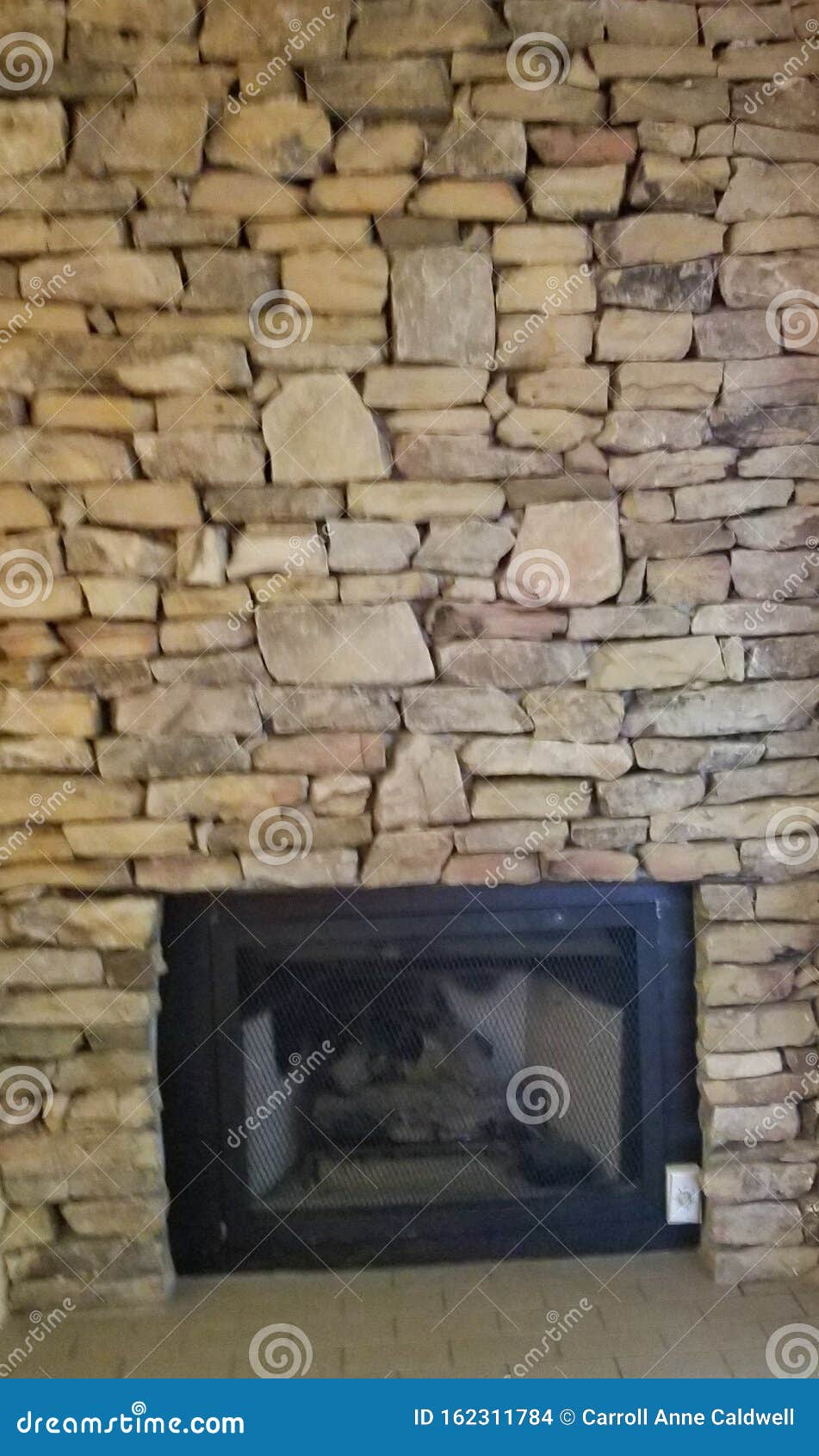 Gas Fireplace Insert in a Natural Stone Wall Stock Photo Image of