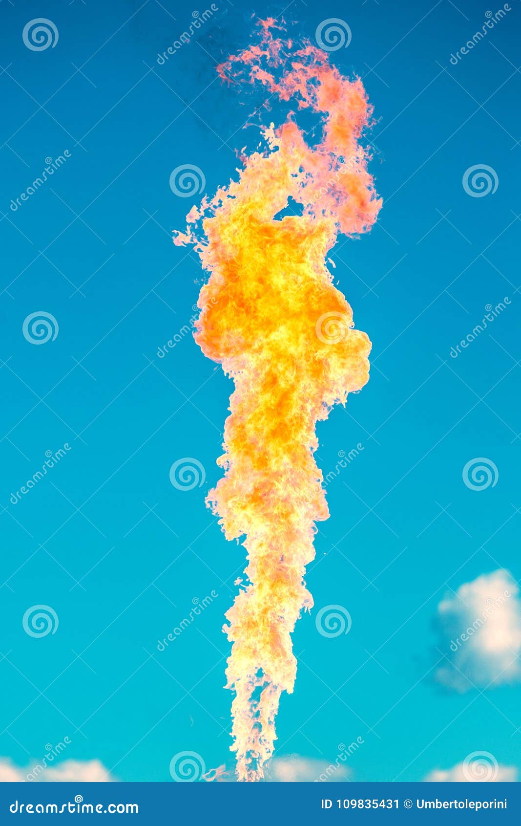 Gas flame on a blue sky stock image. Image of power 109835431