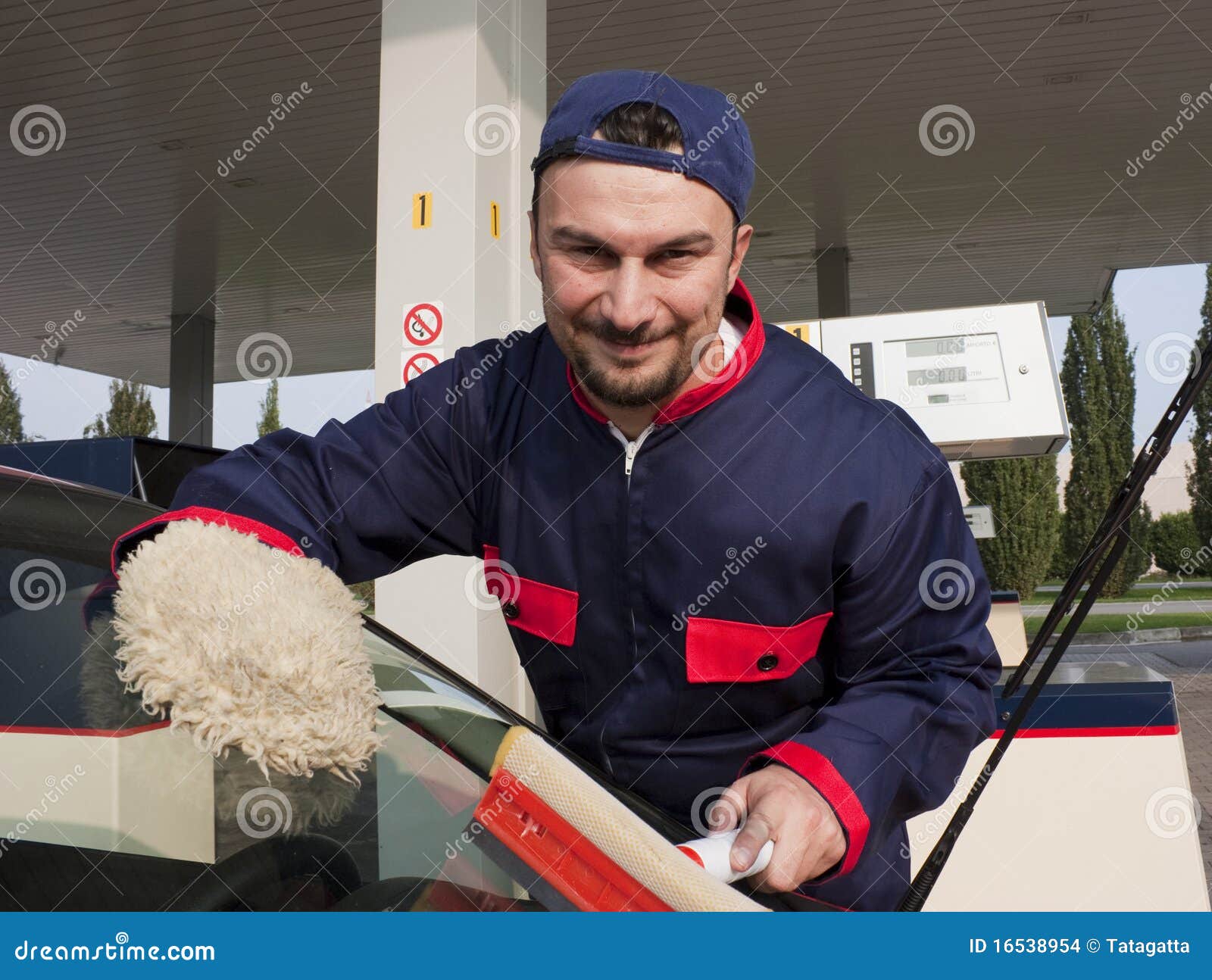 Gas Jockey Cleaning Windshield Stock Photo Image of male
