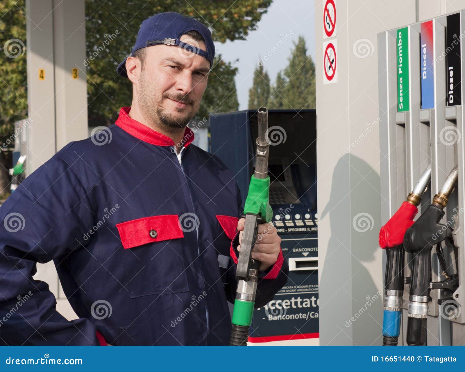 Gas Jockey Refilling Car stock photo. Image of energy 16651440