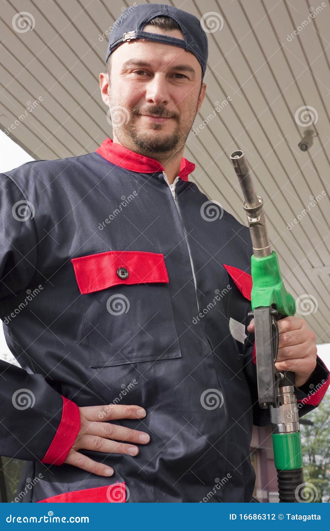 Gas Jockey Refilling Car stock photo. Image of diesel 16686312
