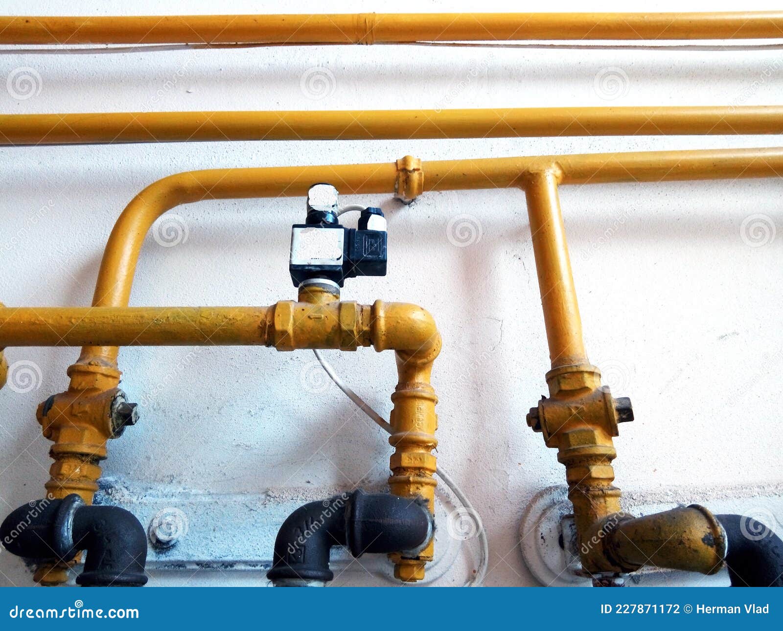 Gas pipes on a wall stock photo. Image of romania, wall 227871172