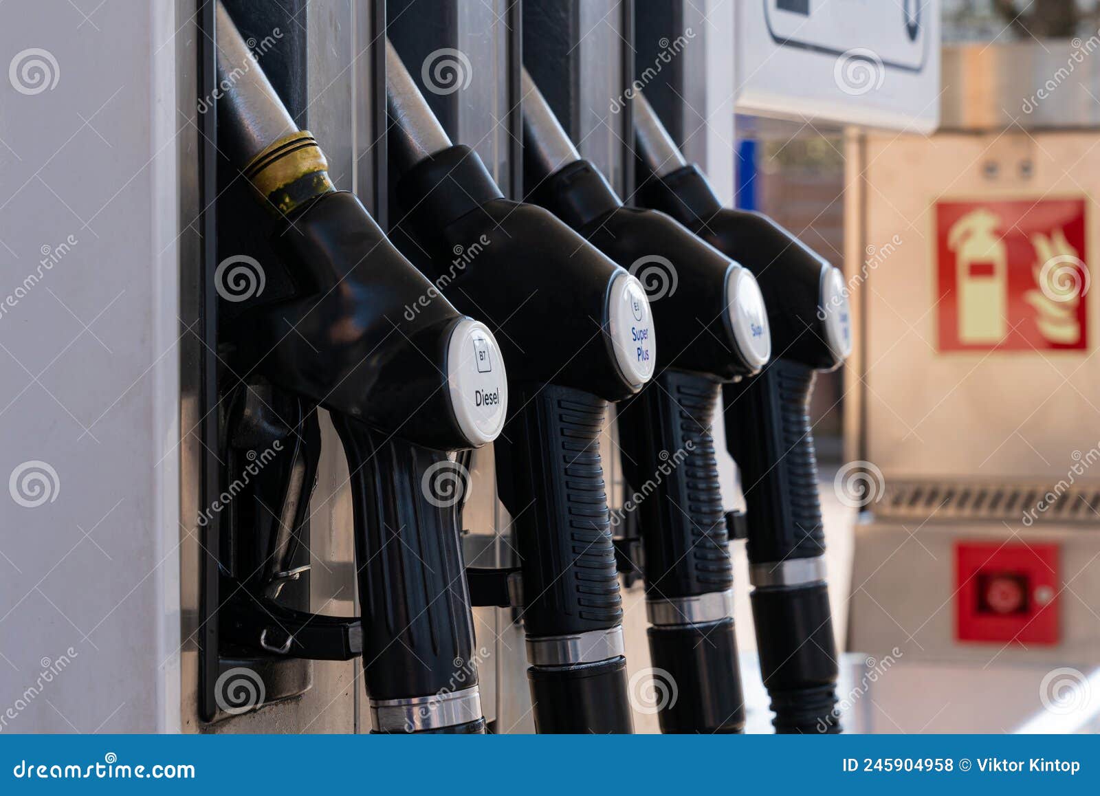 a gas pump nozzles at a gas station