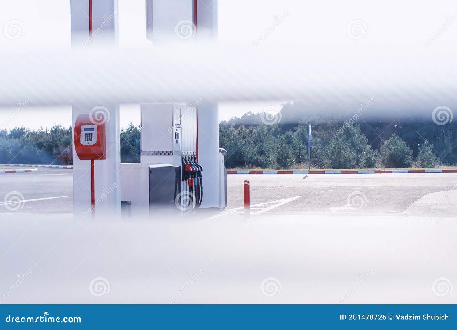 Gas Station Closeup with Colored Fuel Hoses Stock Photo Image of