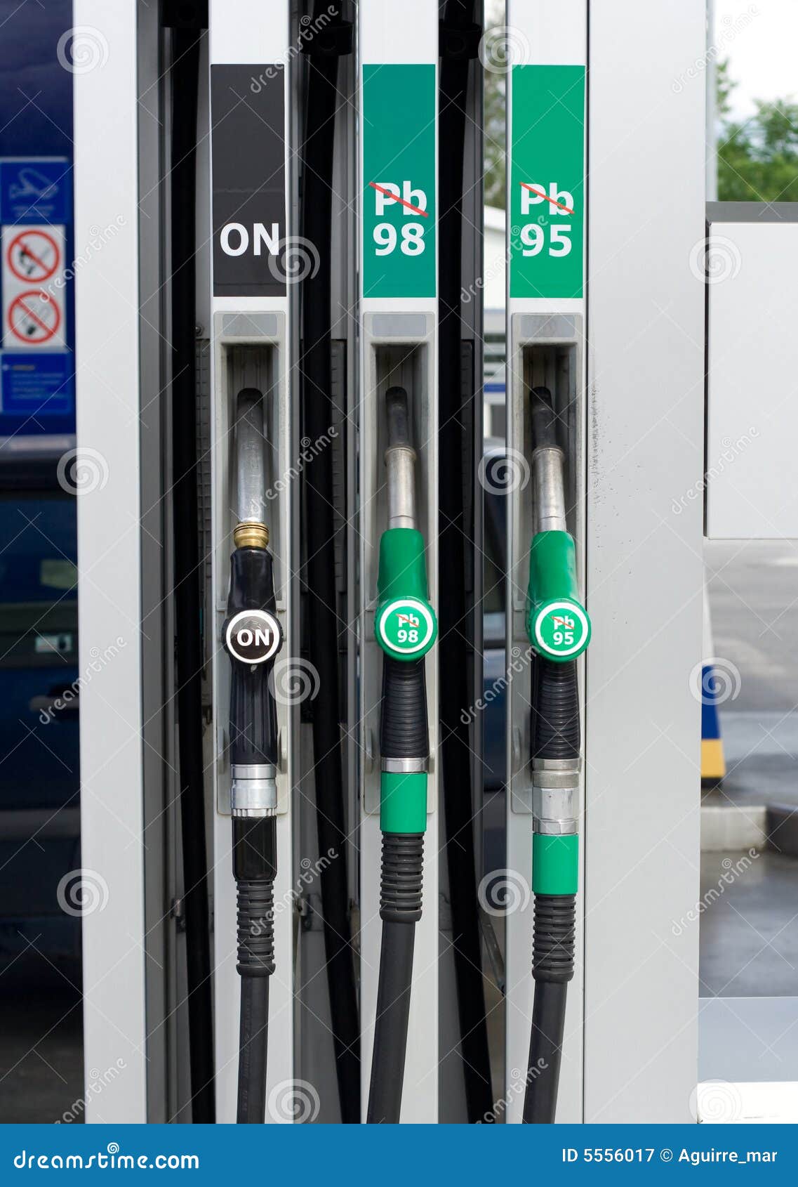 Gas station nozzles stock image. Image of pump, filing 5556017