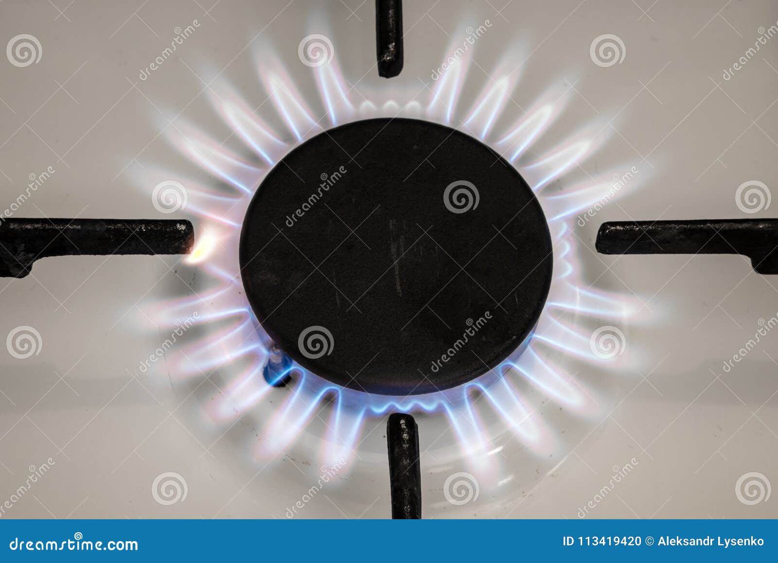 Gas Stove Flame on Kitchen. Blue Fire Flame from Stove Stock Photo