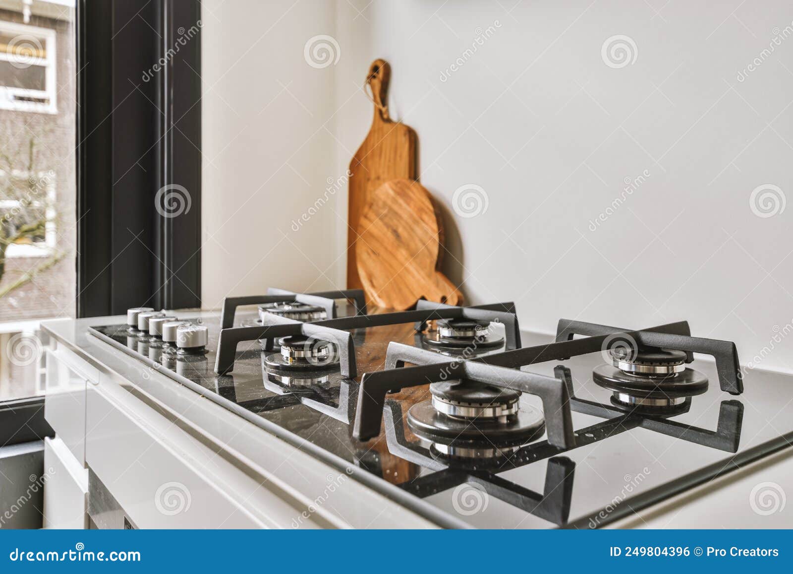Gas stove in the kitchen stock photo. Image of stainless 249804396