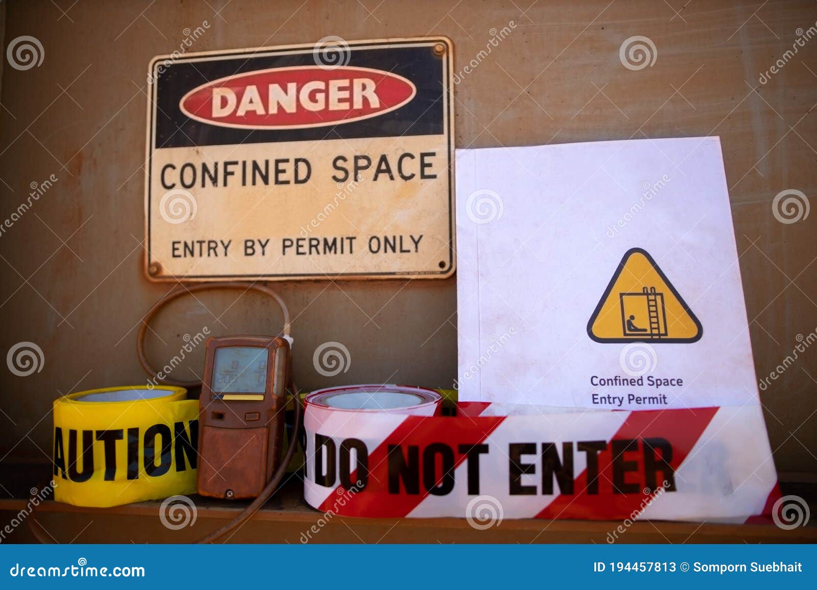 gas test leak atmosphere confined space warning sign permit entry by permit only and red barricade danger tape