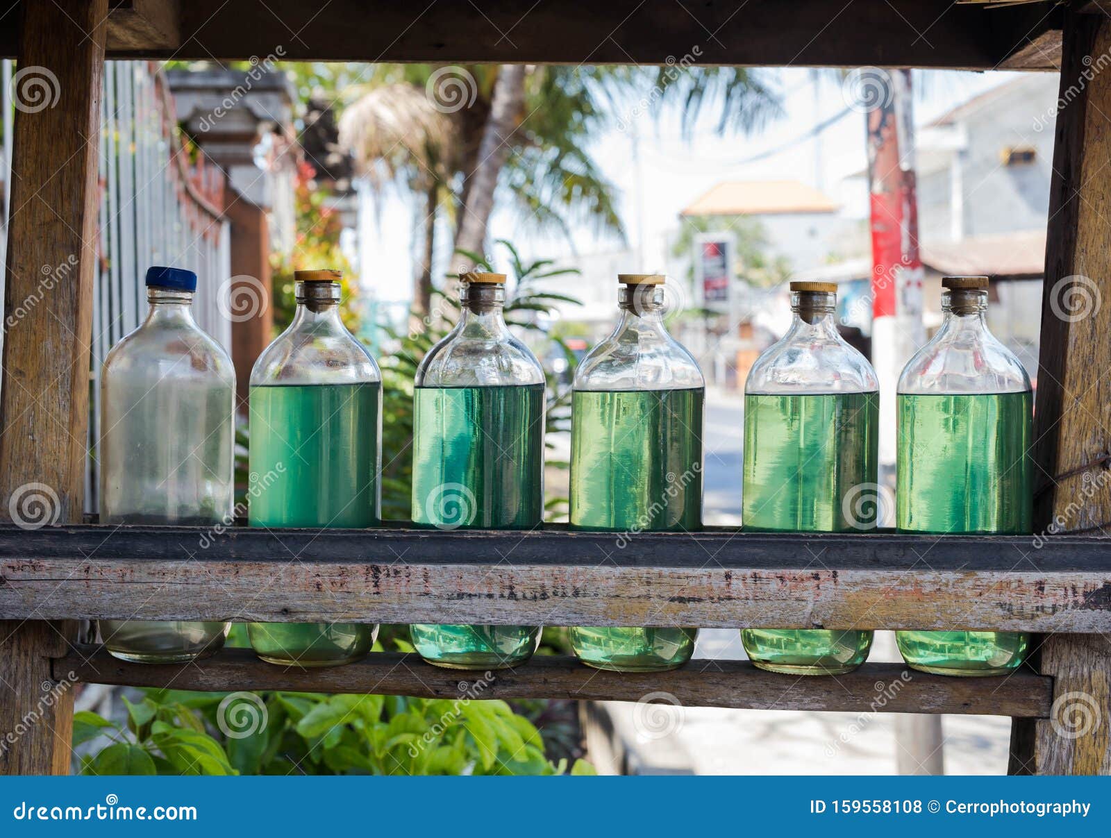 gasolina in bottles for sale on bali indonesia, petrol at local station