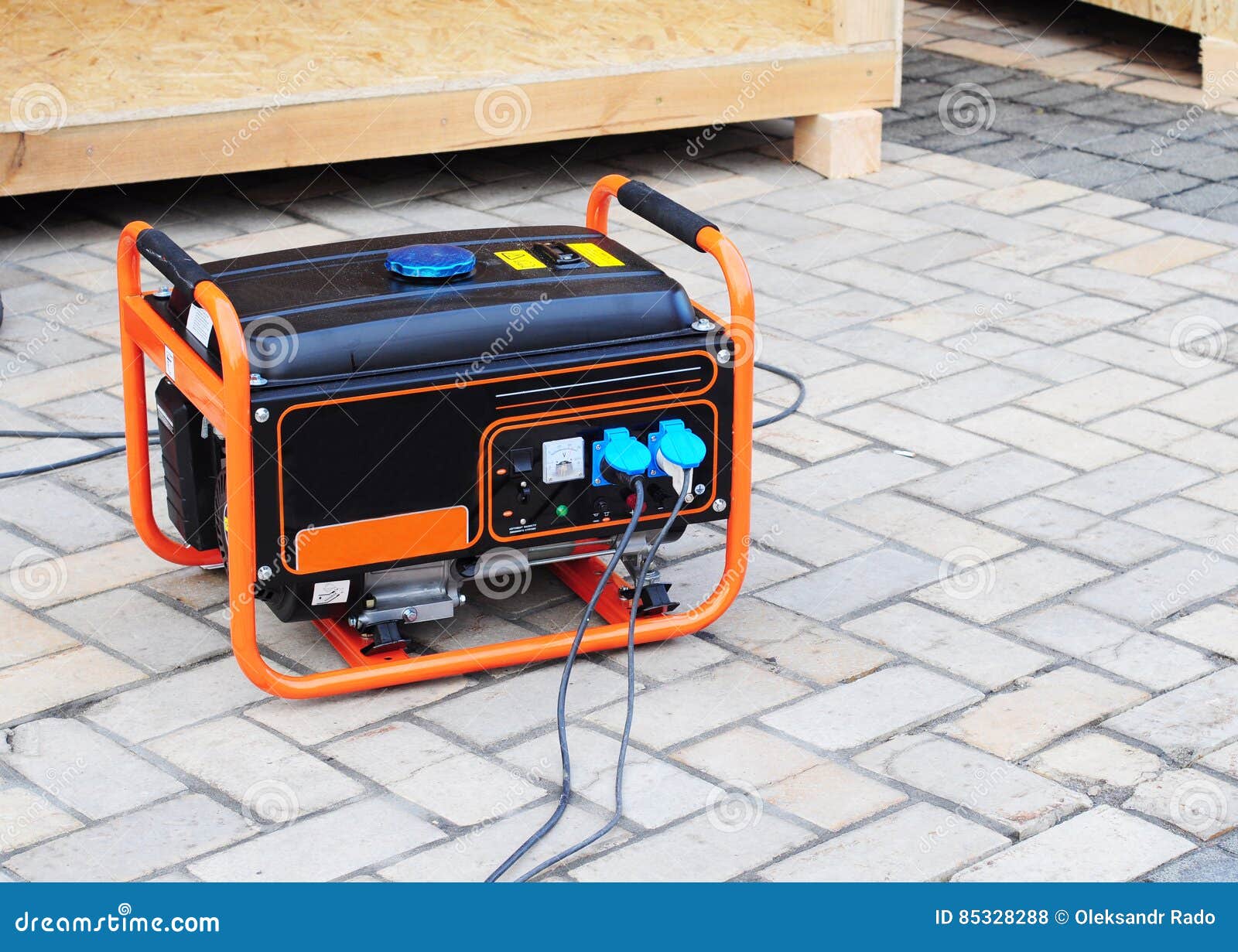 gasoline portable generator on the house construction site. close up on mobile backup generator. standby generator