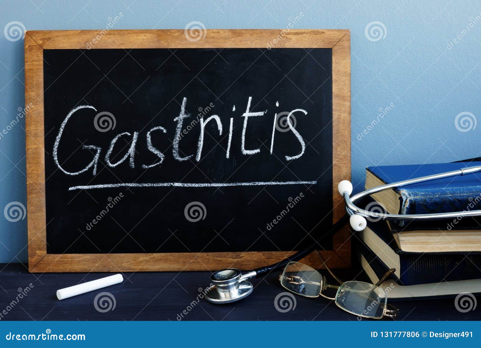 gastritis written on a blackboard in a hospital.