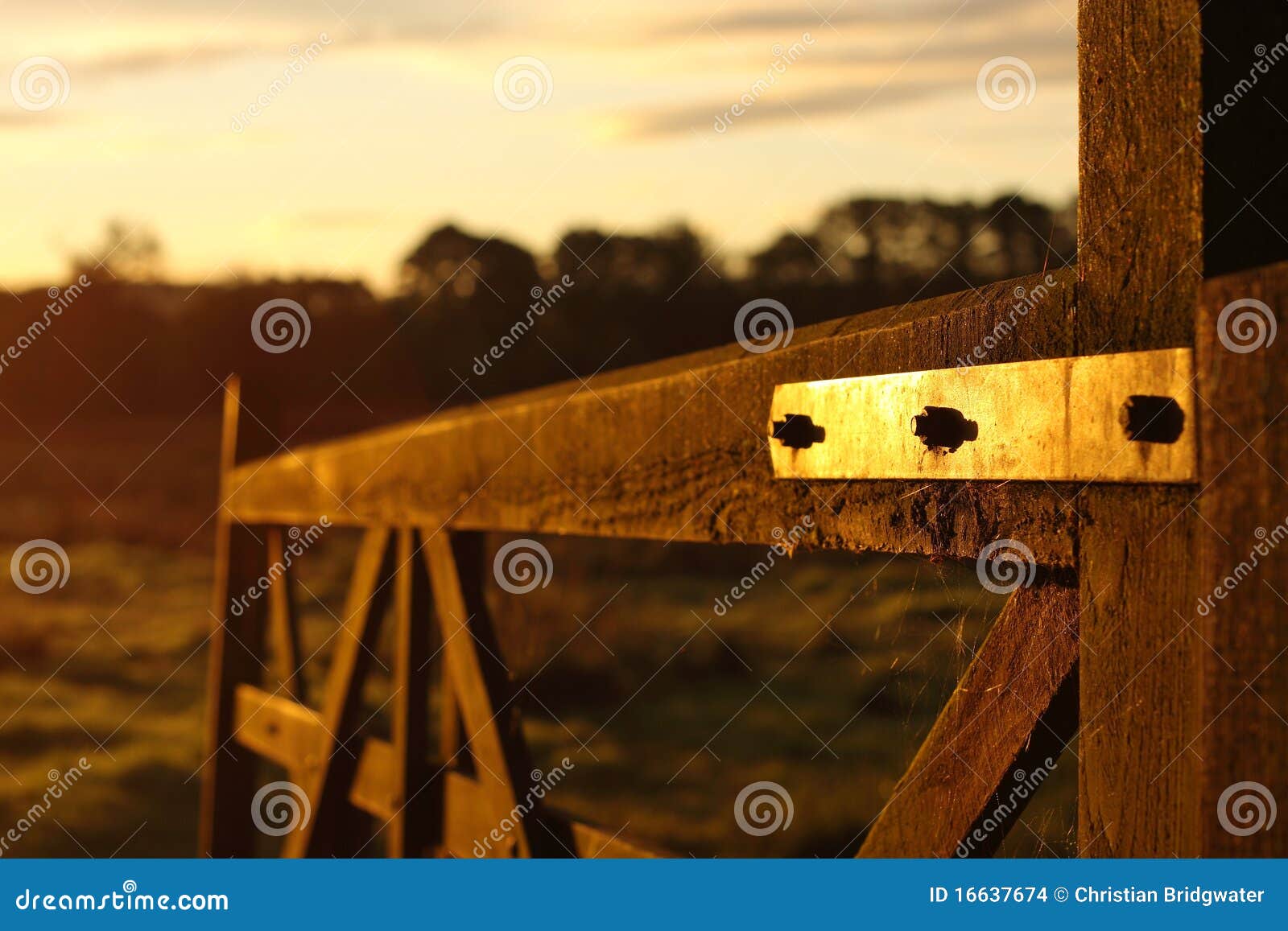 Gate at sunrise. Photograph of a gate taken at sunrise on an autumn morning