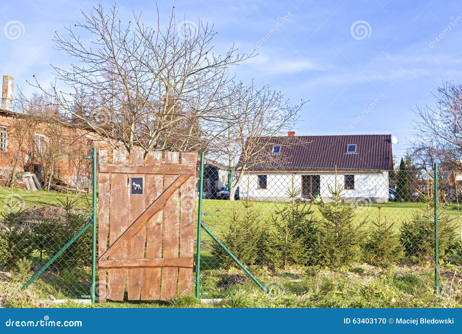 Gate To a Village House with Adjacent Buildings Stock Photo Image of