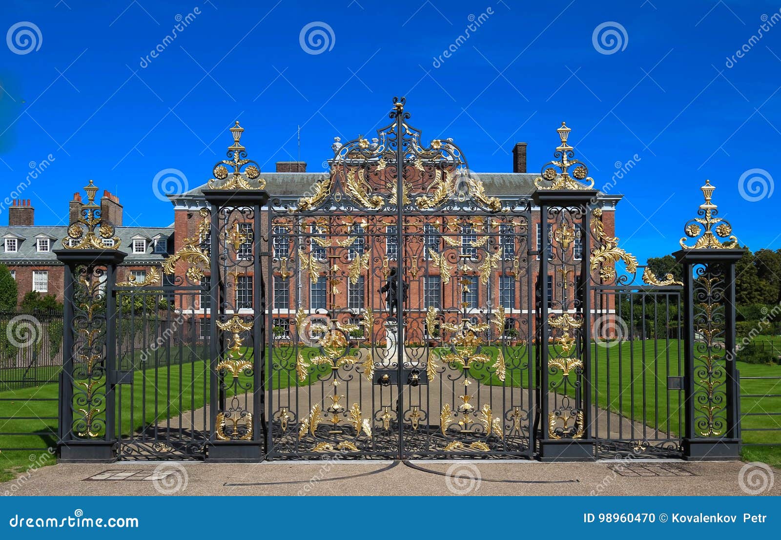 the gates of kensington palace in hyde park in london, england