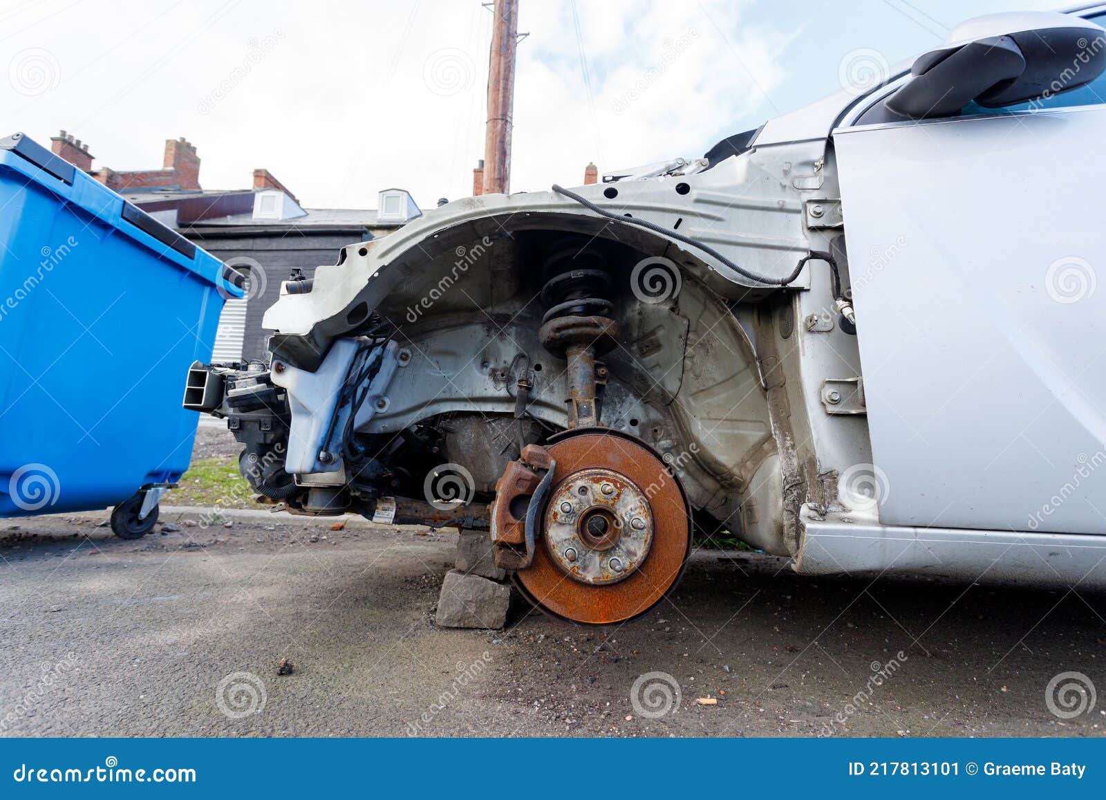 A Broken Down Car with Wheels Removed on Bricks Stock Image Image of