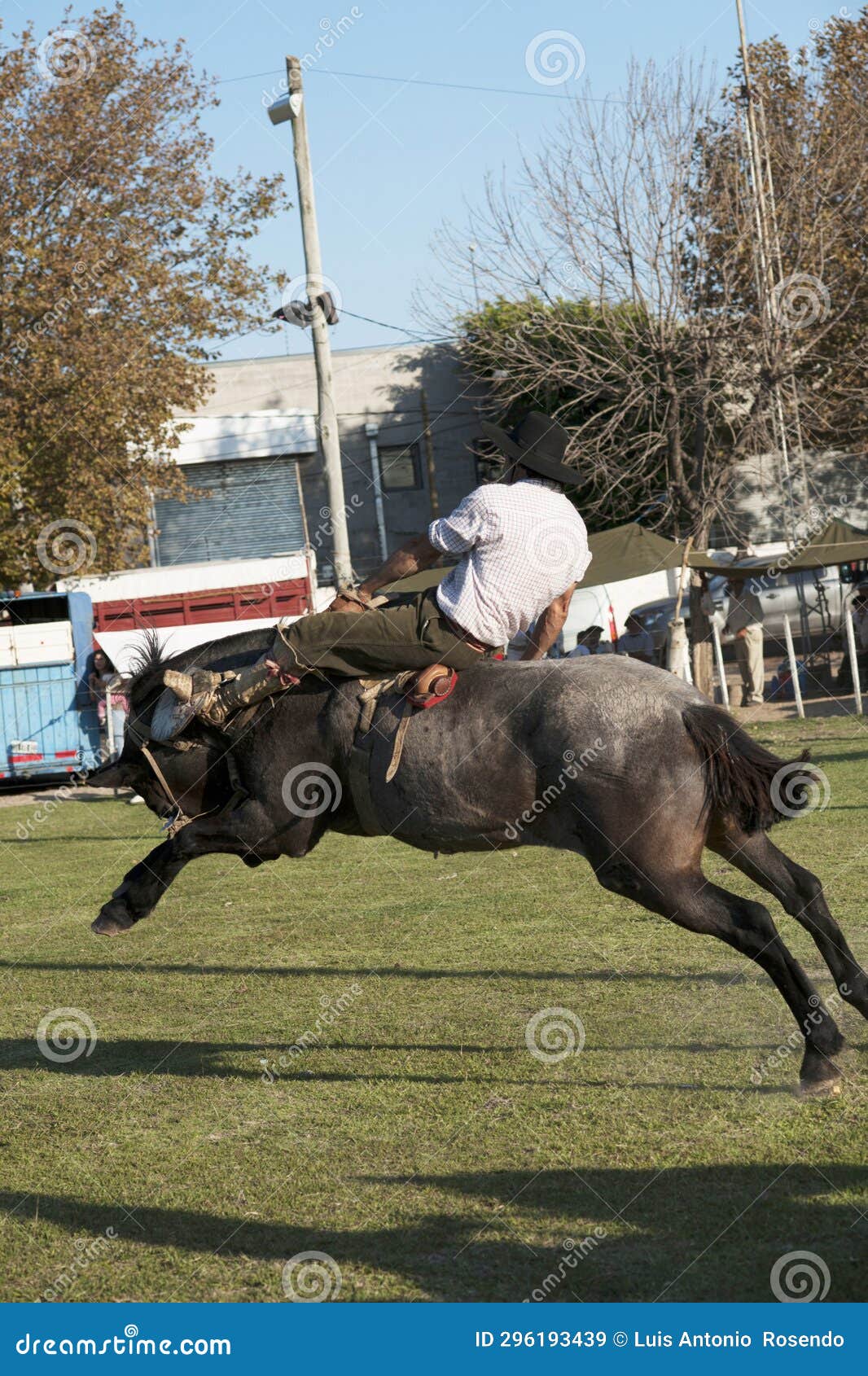 gaucho cowboy vaquero at a rodeo riding a horse at a show in argentina