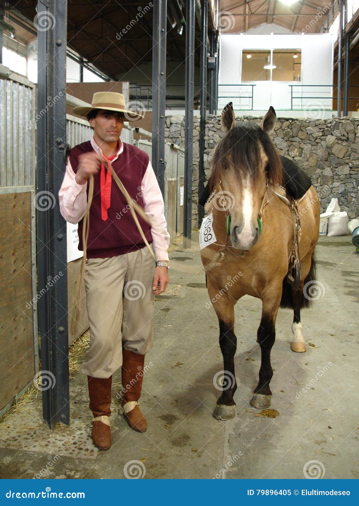 gaucho with his horse with the characteristic clothing in argentina