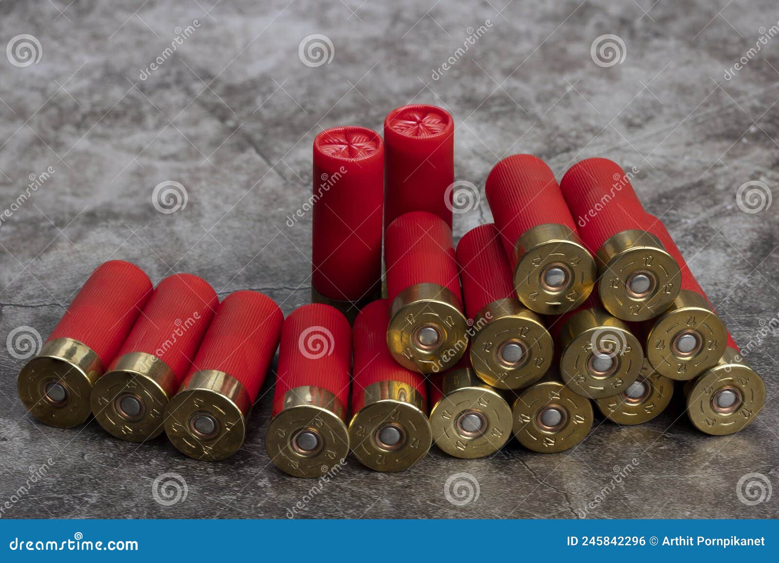 12 gauge , red shotgun shell ammunition on texture background