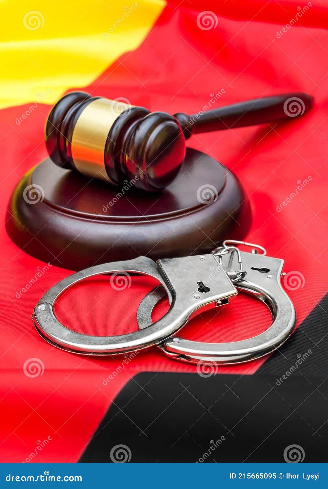Gavel with Handcuffs on German Flag. German Law Concept Stock Image