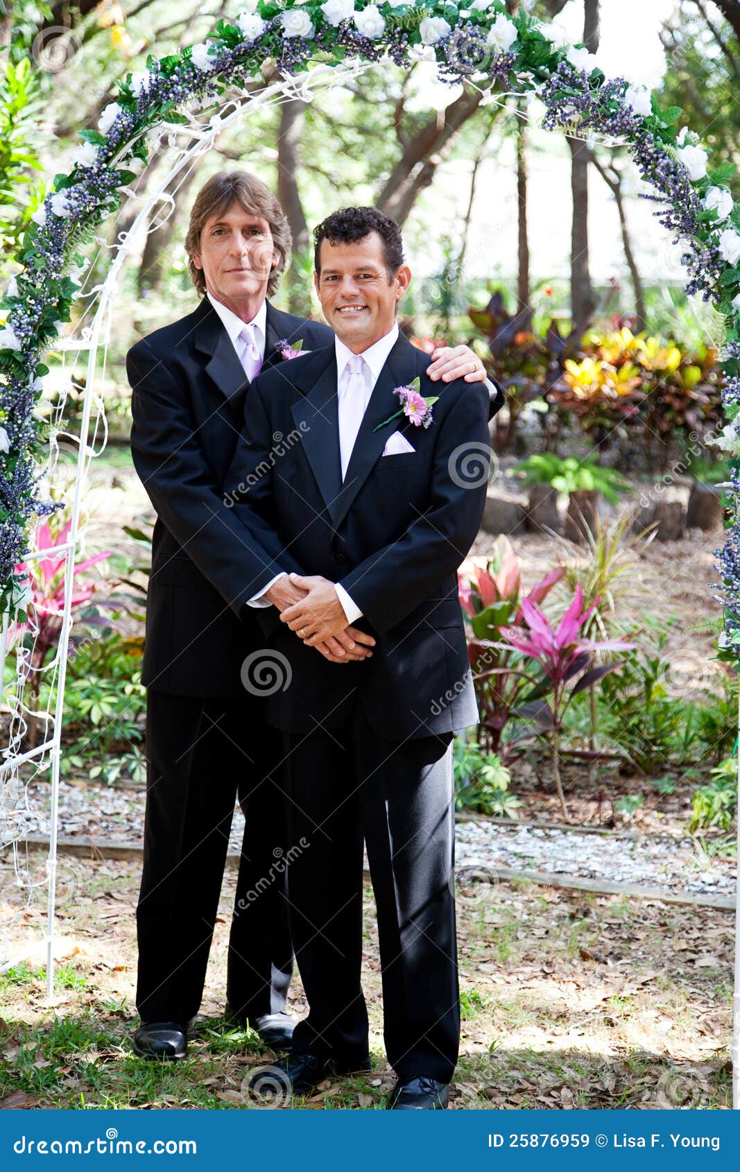 Gay Couple Under Wedding Arch Royalty Free Stock Images