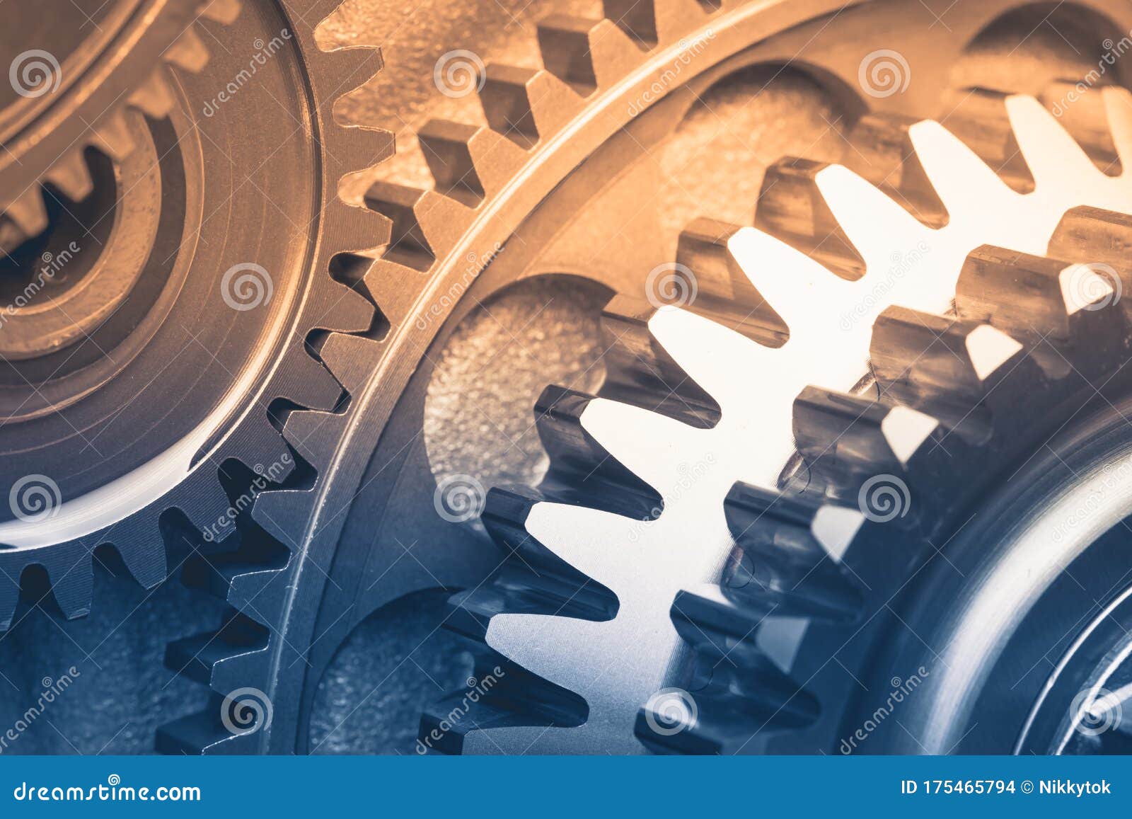 Gears Industrial Background with Warm Shiny Light Stock Photo Image