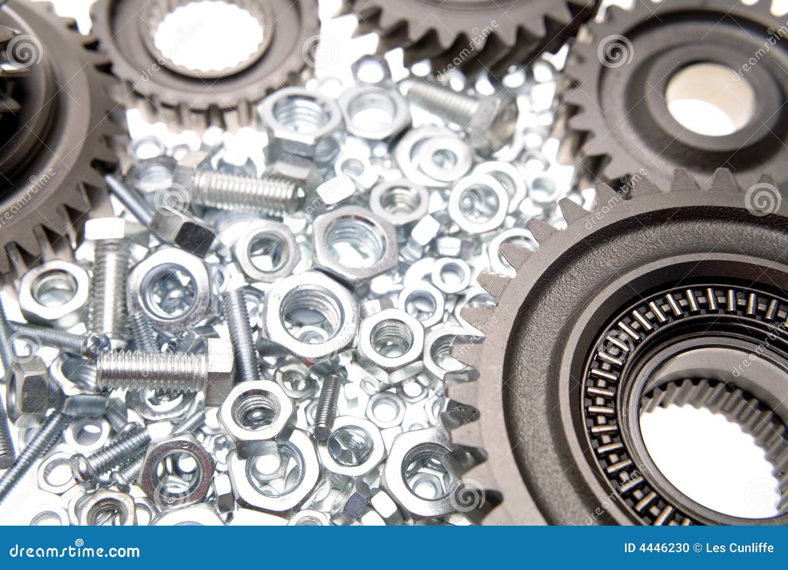 Gears, nuts and bolts stock photo. Image of strength, manufacturing