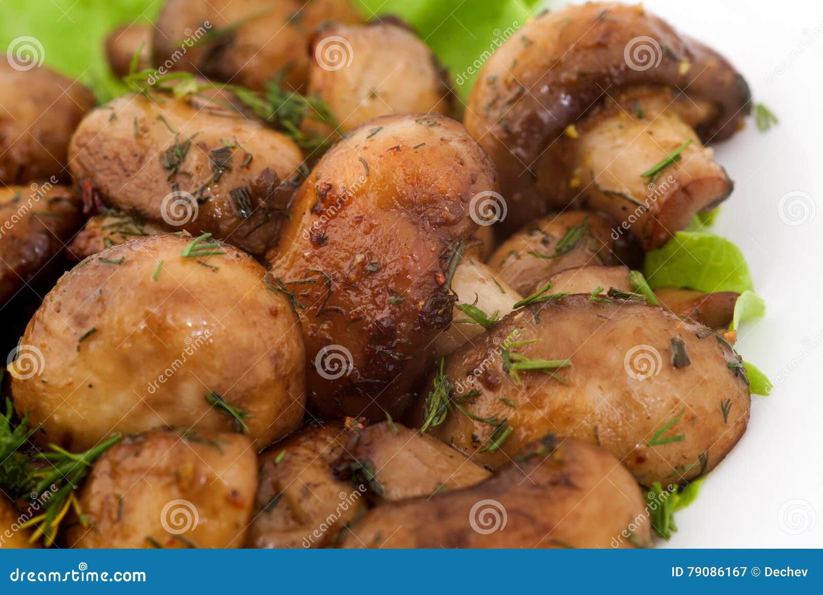 Gebackene Pilze in Einer Knoblauchbutter Mit Petersilie Stockbild ...