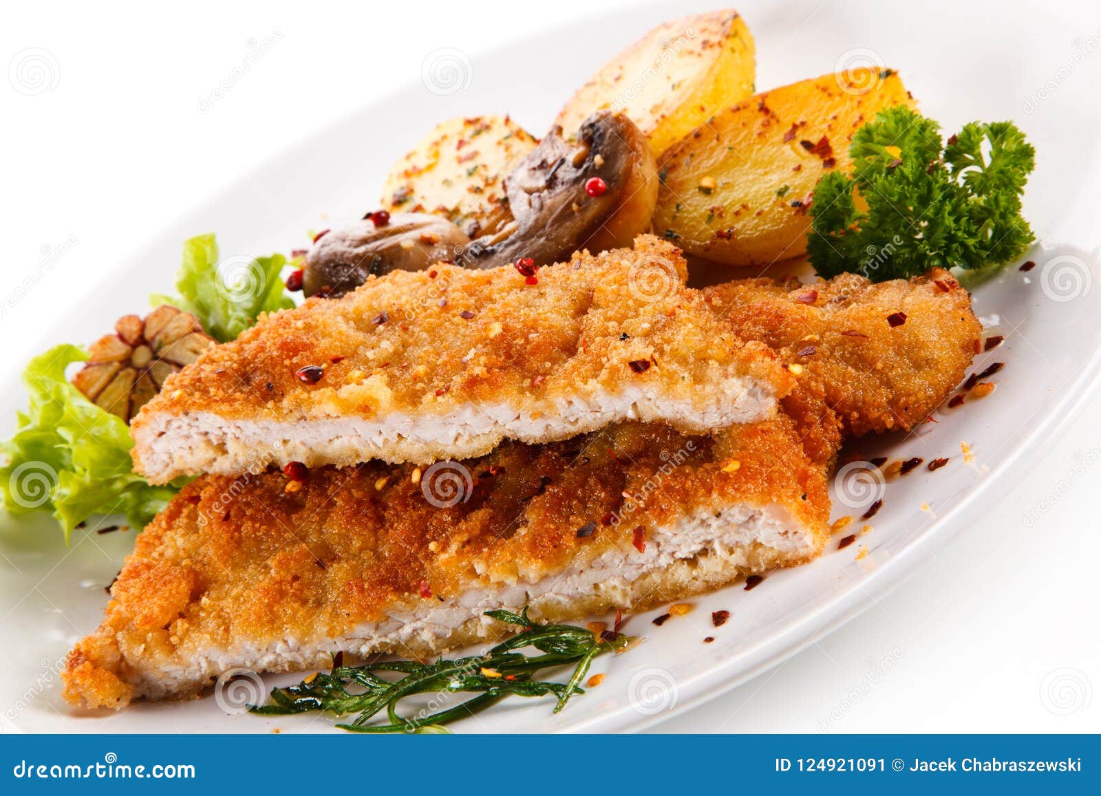 Gebratenes Schweinekotelett Mit Kartoffeln Und Champignon Stockbild ...