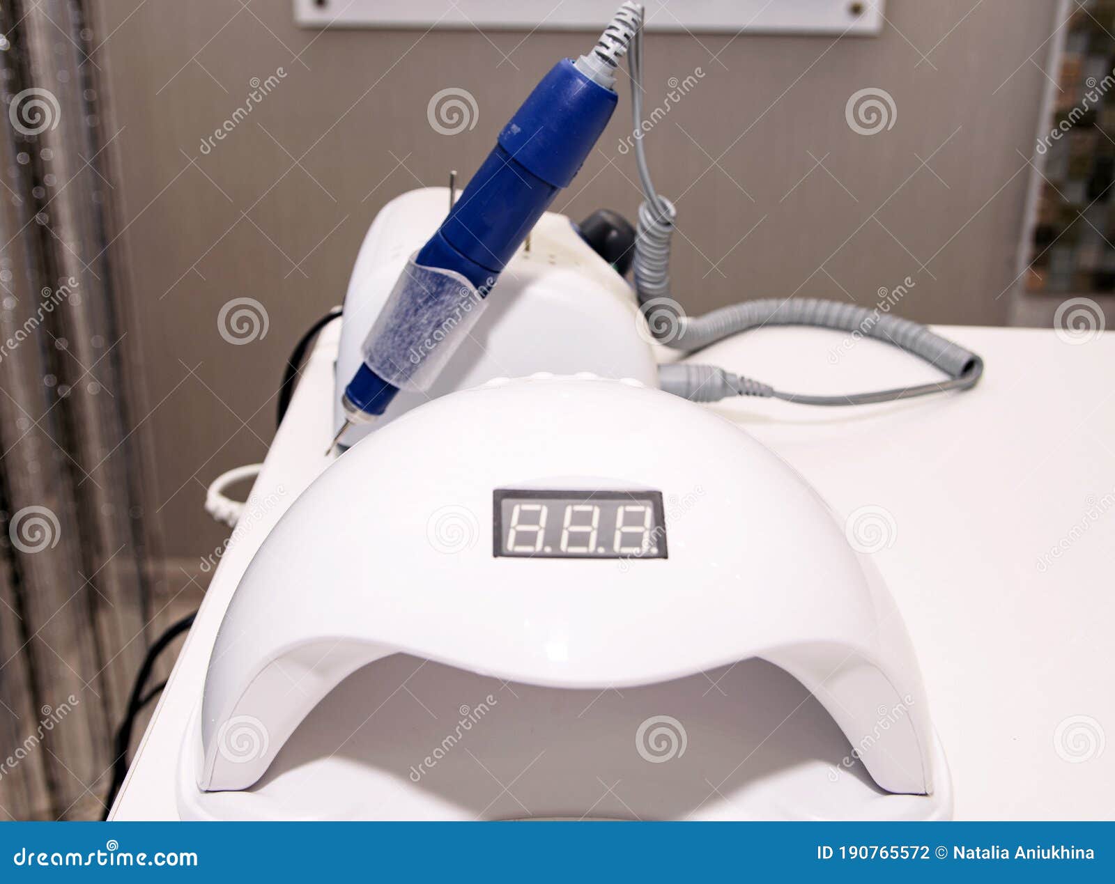 gel polish remover and manicure dryer on a table