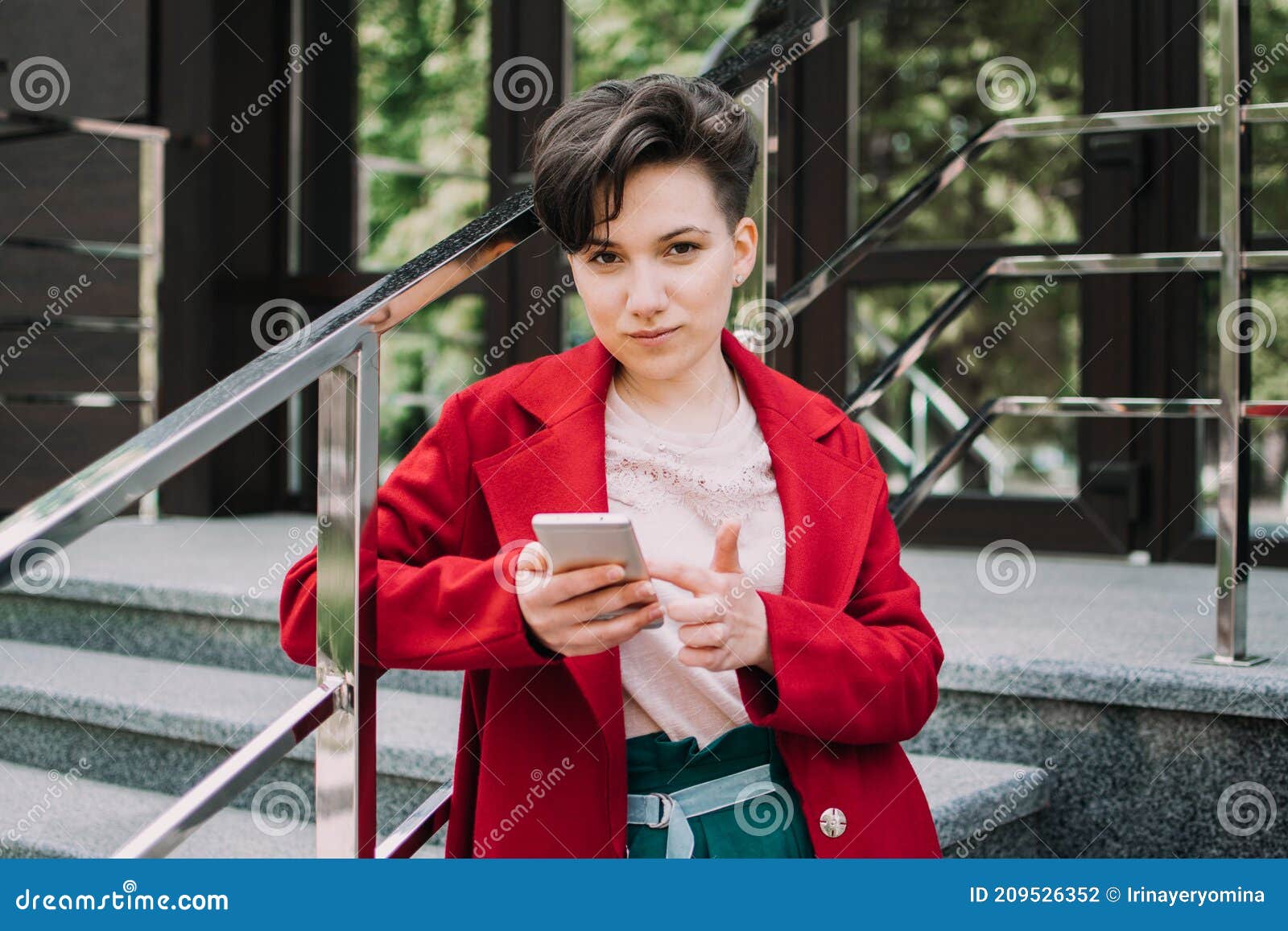 gen z, social media, influencer, technology, youth millennial people concept. young brunette girl with short hair using