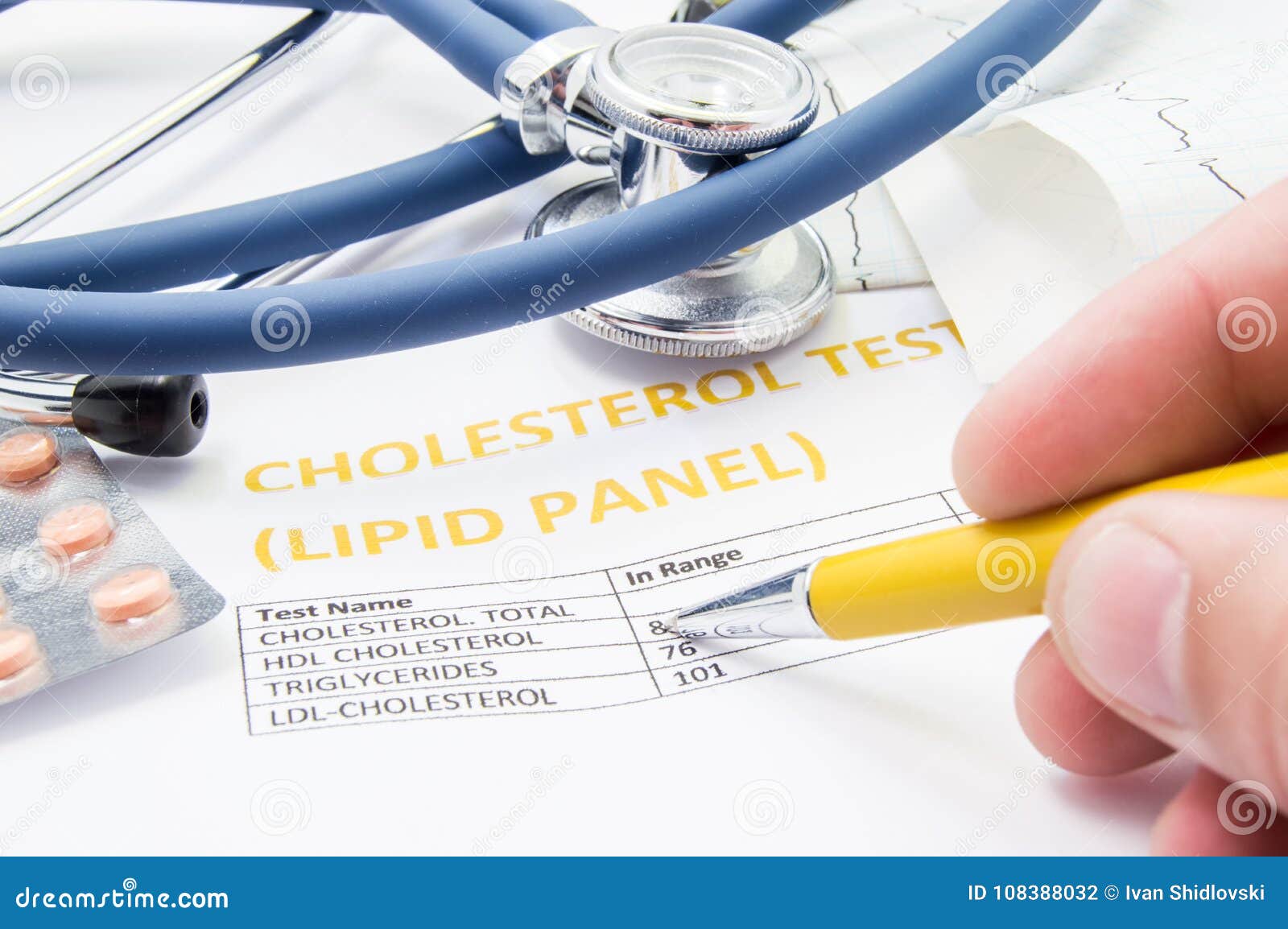 general practitioner checks cholesterol levels in patient test results on blood lipids. statin pills, stethoscope, cholesterol tes