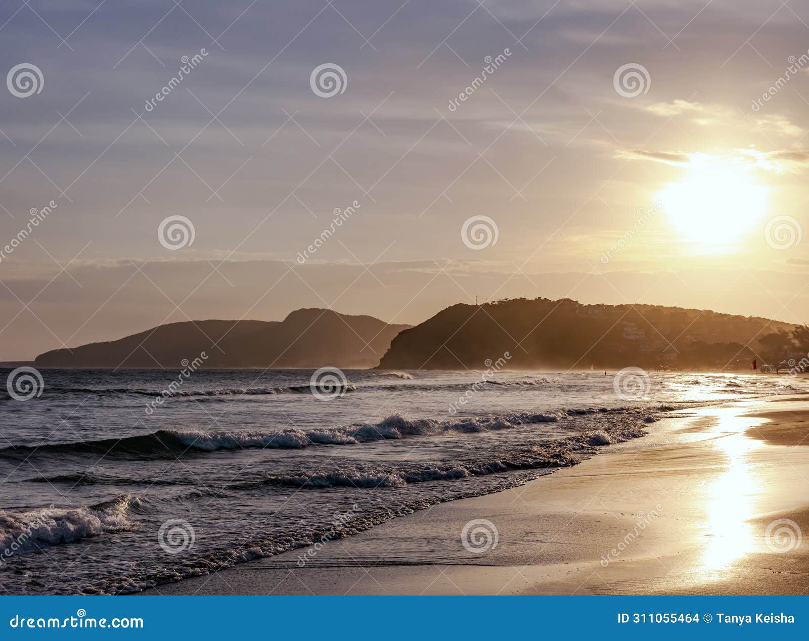 waves of the atlantic ocean at geriba beach on sunset in buzios
