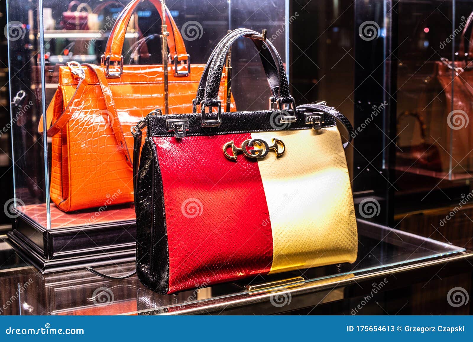 Fake world-famous brands, fake Prada handbags, Gucci bags Valencia Spain  street sale Prada handbag Stock Photo - Alamy