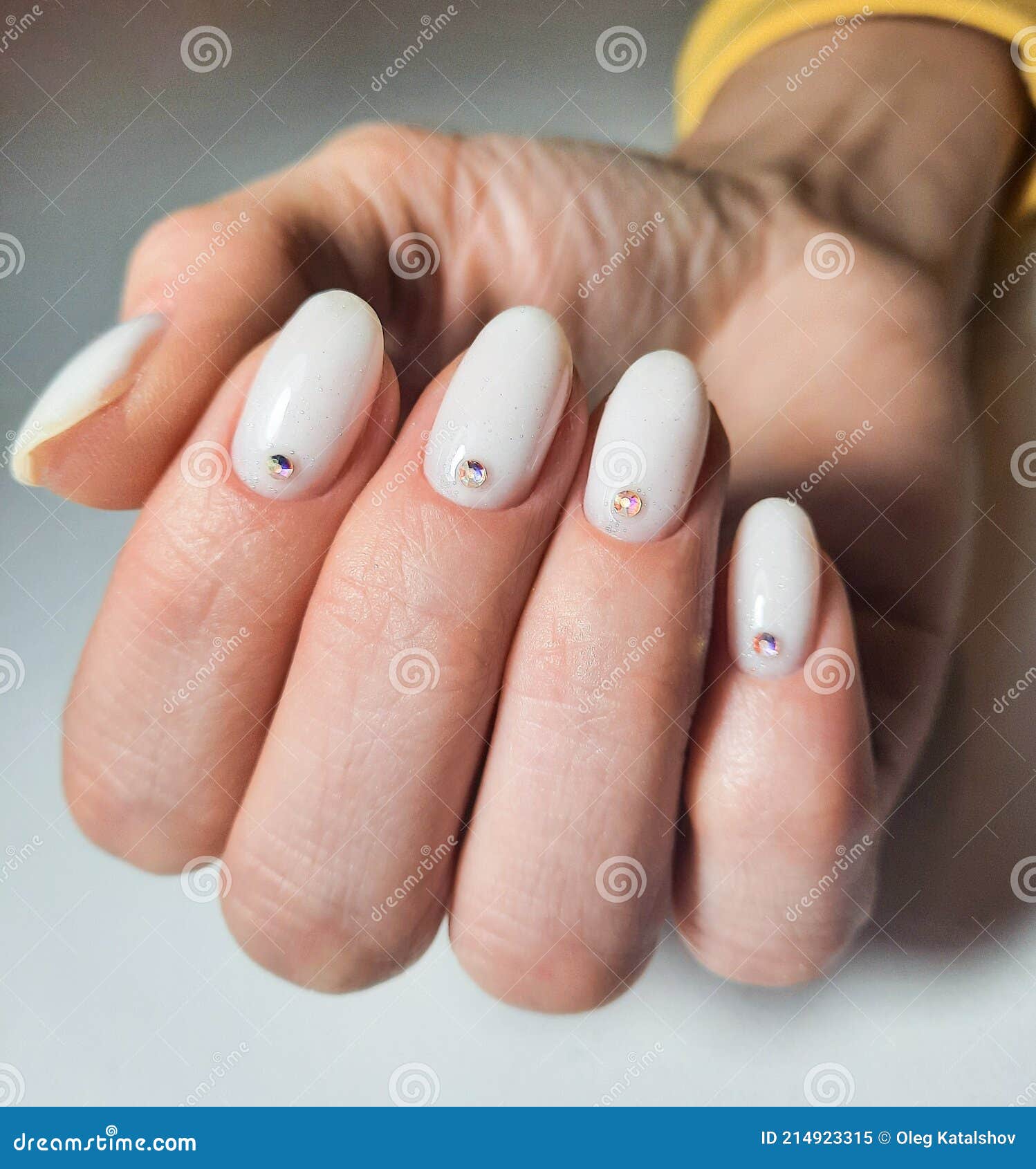 Gentle Gel Polish of Milky Color on Short Nails with Sequins and  Rhinestones. Nude Manicure with Diamond and Sequin Design Stock Image -  Image of gentle, delicate: 214923315