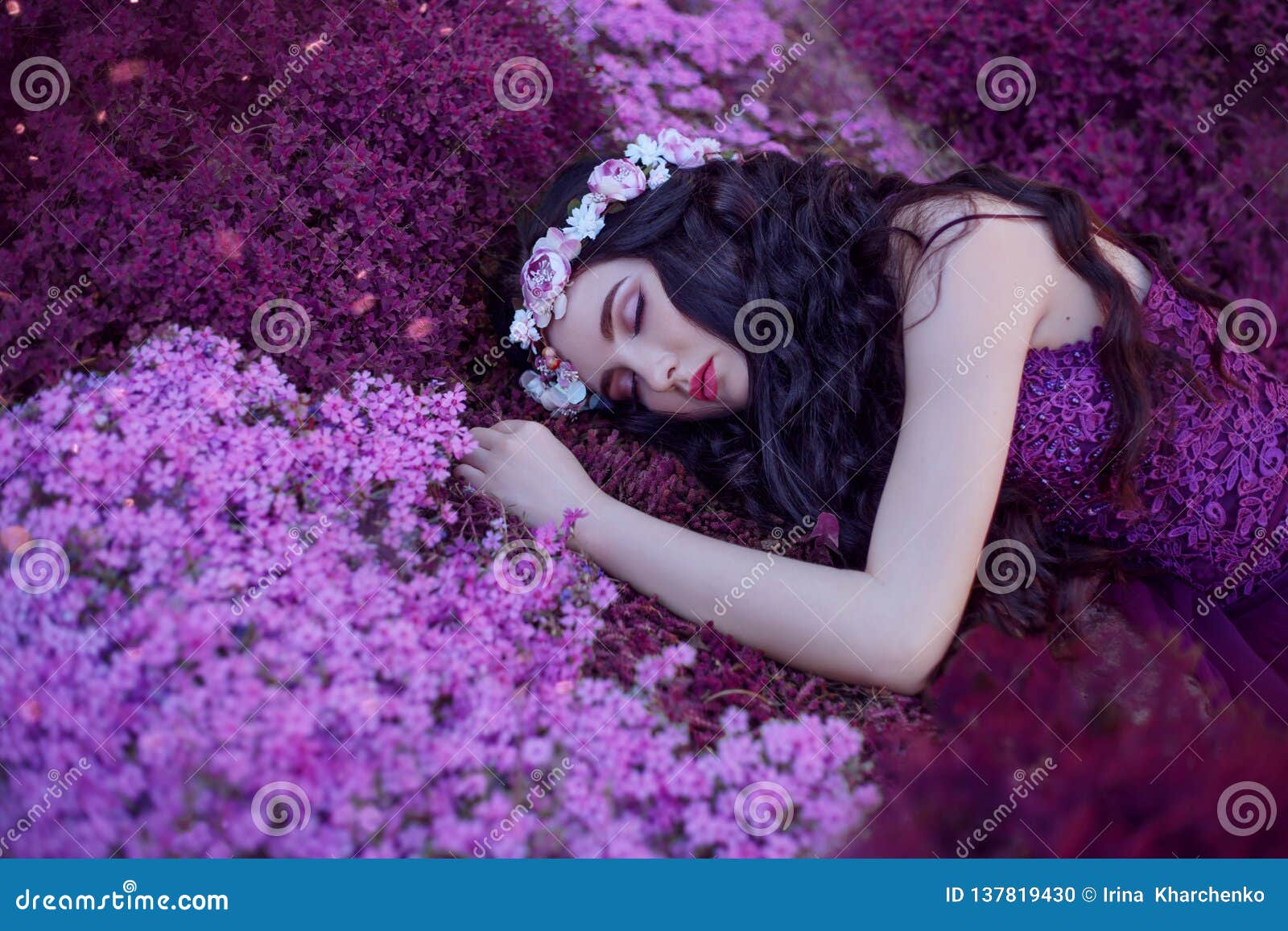 A Gentle and Graceful Girl Sleeps on a Purple Flower a Dreaming Beauty with Long Dark Hair and a Pink Stock Photo - Image of angel, nature: 137819430